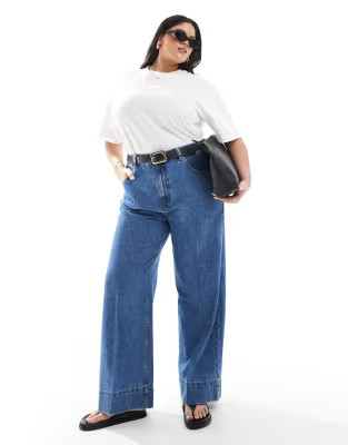 ASOS DESIGN Curve wide leg jeans with crease front in dark mid blue | ASOS (Global)