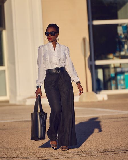 Black and white never gets old! Wearing black wide-leg linen pants with a lace detail white blouse for a preppy Summer office look 🖤 The blouse is currently on sale and fits true to size! Looks great with jeans too so better get yourself one! Banana Republic, Ann Taylor, Coach, Amazon fashion, linen pants style, white dressy blouse, Summer elevated casual, Summer workwear

#LTKover40 #LTKfindsunder100 #LTKstyletip