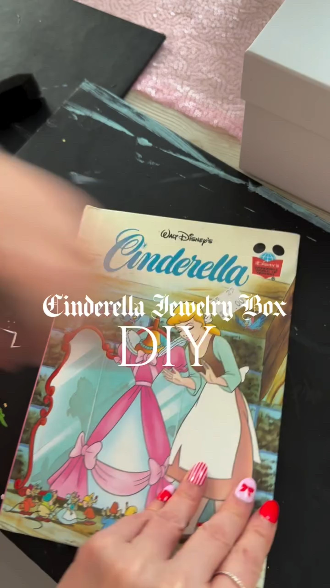 Cinderella inspired jewelry box🎀💕 I made this for my daughter and we did it together. I thrifted the book for $0.50 and we cut out all the pictures we loved from it. I had this box from @michaelsstores from last Valentine’s Day and we used @modpodgecrafts to glue the pictures onto the box. I made a big pink bow for the top and we glued on rhinestones and trinkets to make it extra special. Inside we added acrylic containers so she could store her jewelry and clips. 

.
Let me know what you think. 🎀💕
.
#princesscrafts #disneyprincess Princess party, craft ideas, diy jewelry box, Cinderella, so this is love, family day weekend