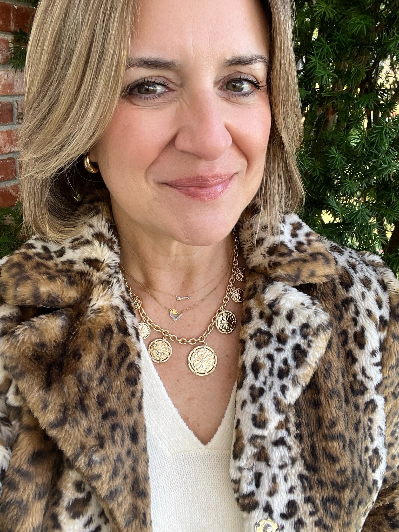 Making a statement with leopard faux fur and a statement necklace! #LTKStyleover50 #LTKStatement #LTK
