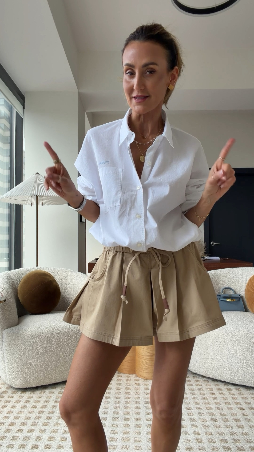 This pleated skort is giving all the girly vibes paired with this oversized button down that comes with an elastic to give a bubble effect — size s. On sale with code KARINA20

#LTKSaleAlert #LTKSeasonal #LTKOver40