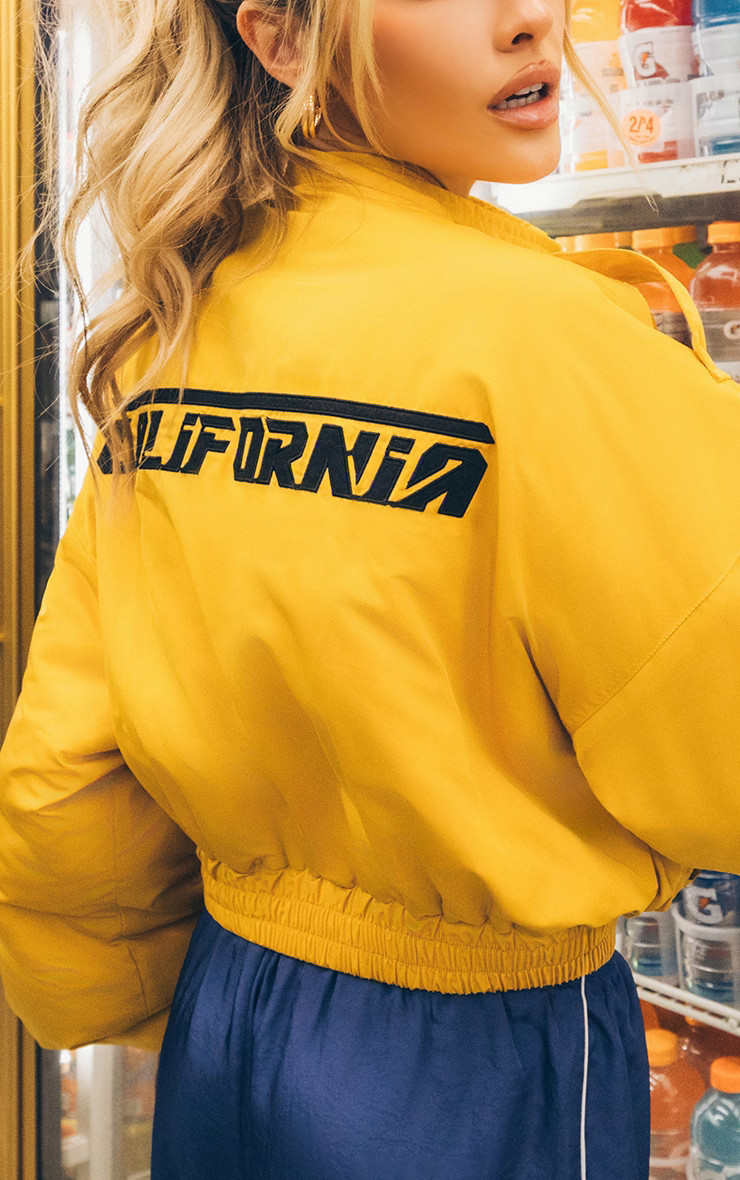 Mustard Yellow Nylon Racer Cropped Bomber Jacket | PrettyLittleThing US
