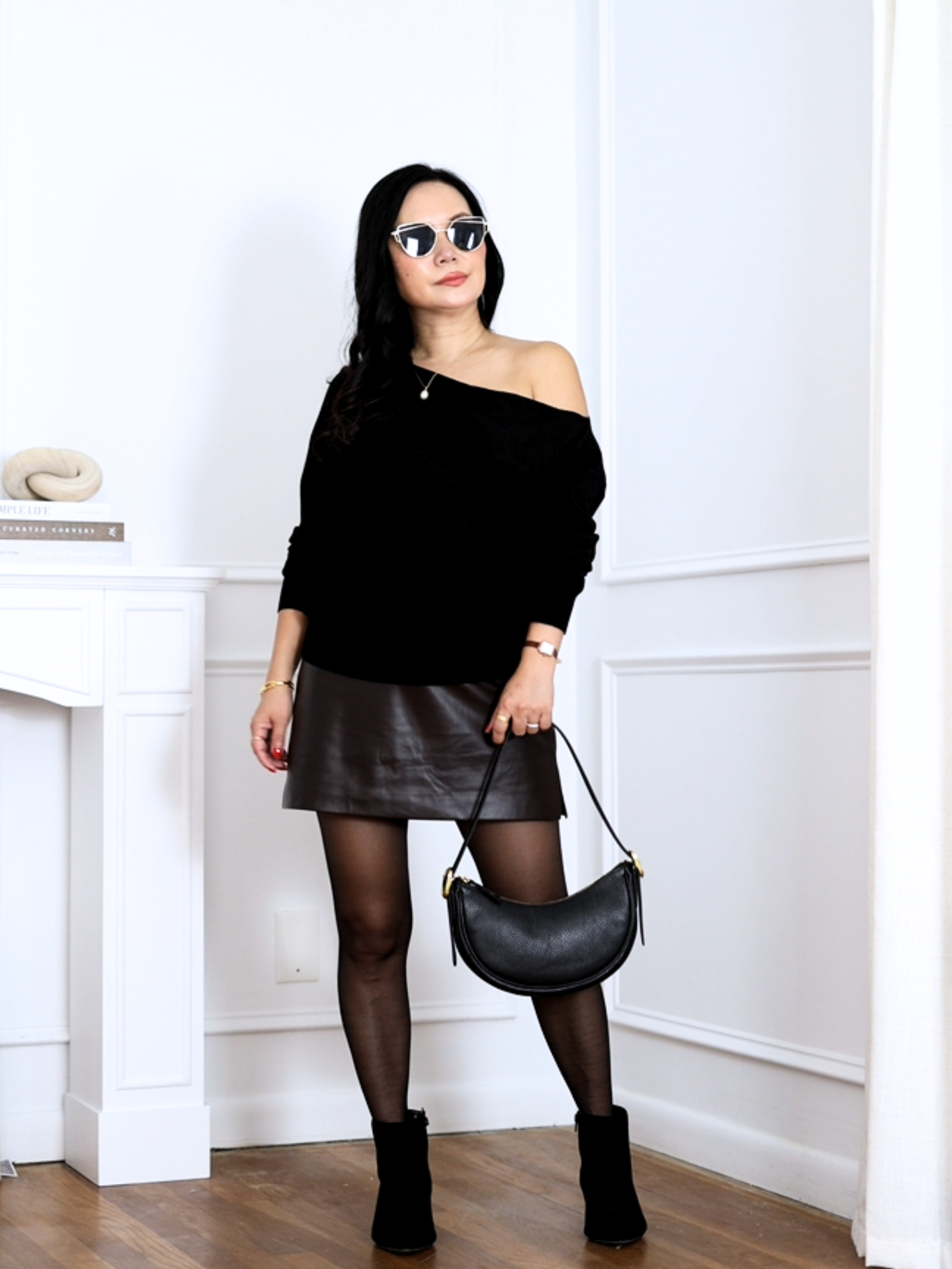 Ankle boots can sometimes cut petite legs off awkwardly, but the sleek shaft on this FREE ASSEMBLY pair from walmart hugs the ankle perfectly. The subtle buckle adds just the right detail without breaking up that long, continuous leg line on a 5’2” frame. Wearing with Quince cashmere sweater and Express skort. 

 #LTKSeasonal #LTKOver40 #LTKPetite