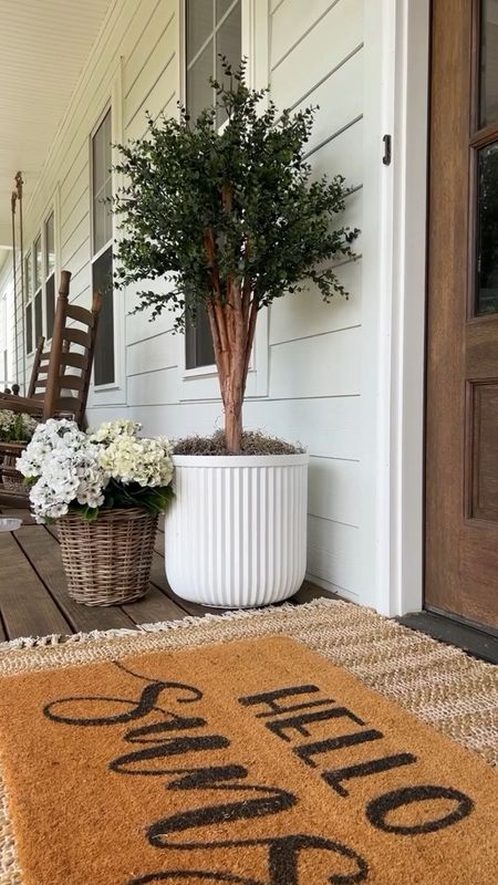 Front porch and front door decor large white fluted planter trending viral home decor pottery barn dupe look a like look for less artificial faux plants trees flowers florals greenery faux geraniums hydrangeas doormat and jute scatter rug layered double modern farmhouse southern porch

#LTKSeasonal #LTKFind #LTKhome
