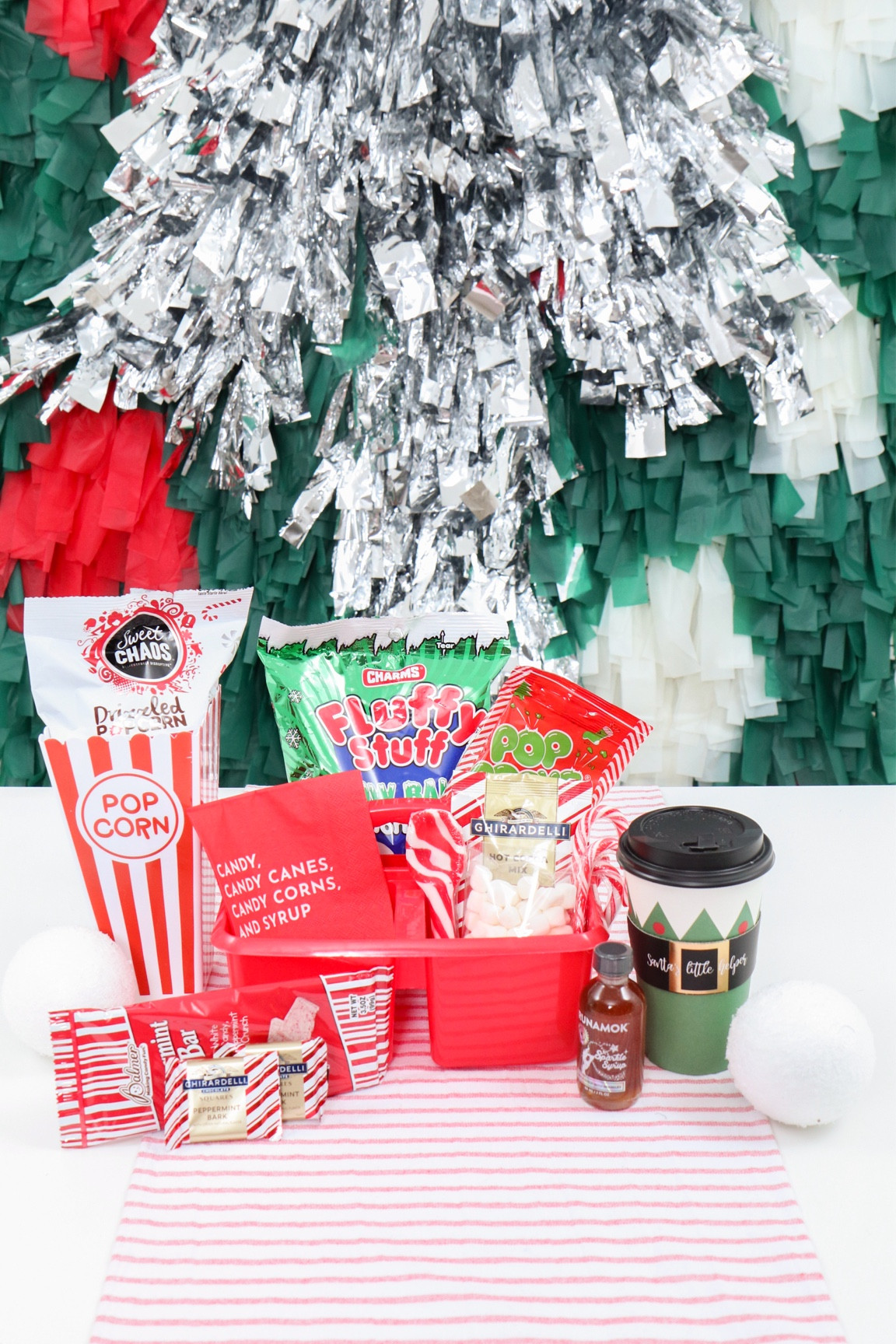 Buddy The Elf movie night snack box! 
🎅🏻🎅🏻🎅🏻
This DIY Christmas Movie Snack Box is just what you need to watch everyone’s favorite holiday movie starring Buddy the Elf
🎅🏻 Covering all the elf food groups and more! peppermint drizzled popcorn, snowballs, candy canes & maple syrup! 
🎅🏻Added some new Elf themed food finds too!
🍽☕️Elf themed napkin & cup @bonjourfete

🎅🏻🎅🏻🎅🏻🎅🏻🎅🏻🎅🏻🎅🏻🎅🏻

#elfthemovie #elfmoviesnacks #elfmovie #christmasmovienight
#christmasmovies #movienight #movienightsnacks #moviesnacks #movienightideas #partyfoods #moviesnackbox

#LTKparties #LTKSeasonal #LTKHoliday