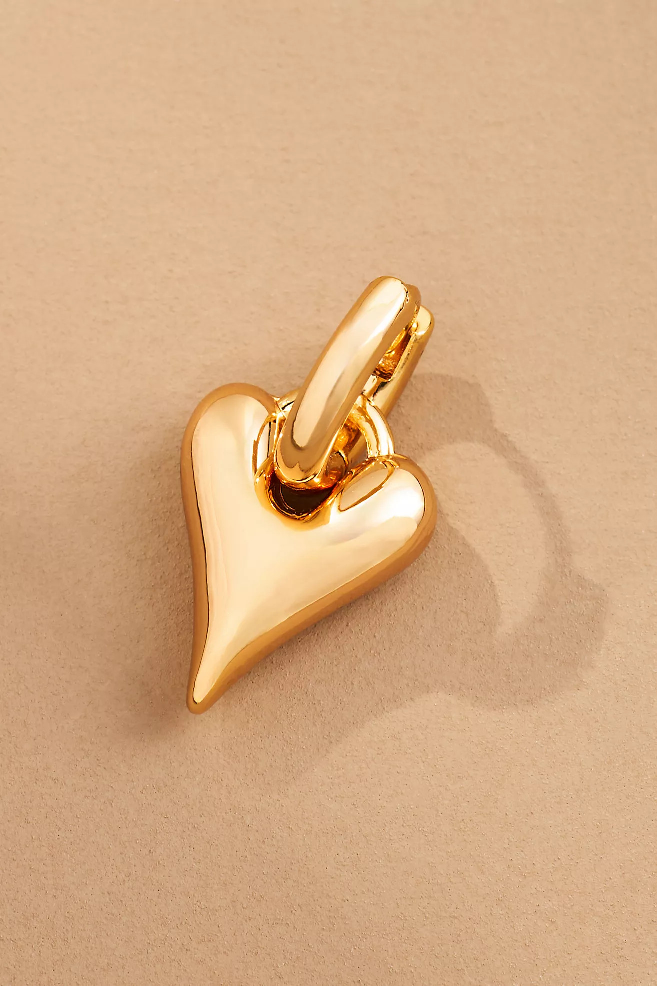 Be Mine Puffy Heart Charm Huggie Hoop EarringsBy Anthropologie3 Reviews Reviews$32.00Color: GOLDF... | Anthropologie (US)