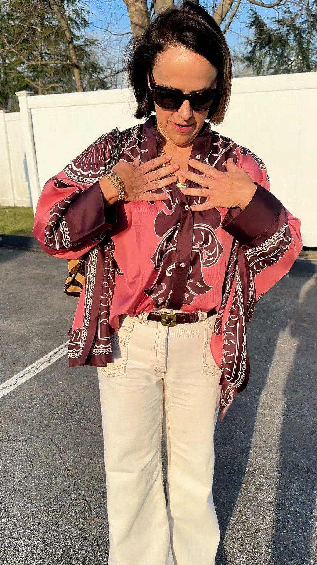 La JJ tops make an outfit! They are so colorful and alive. Shop her look. 