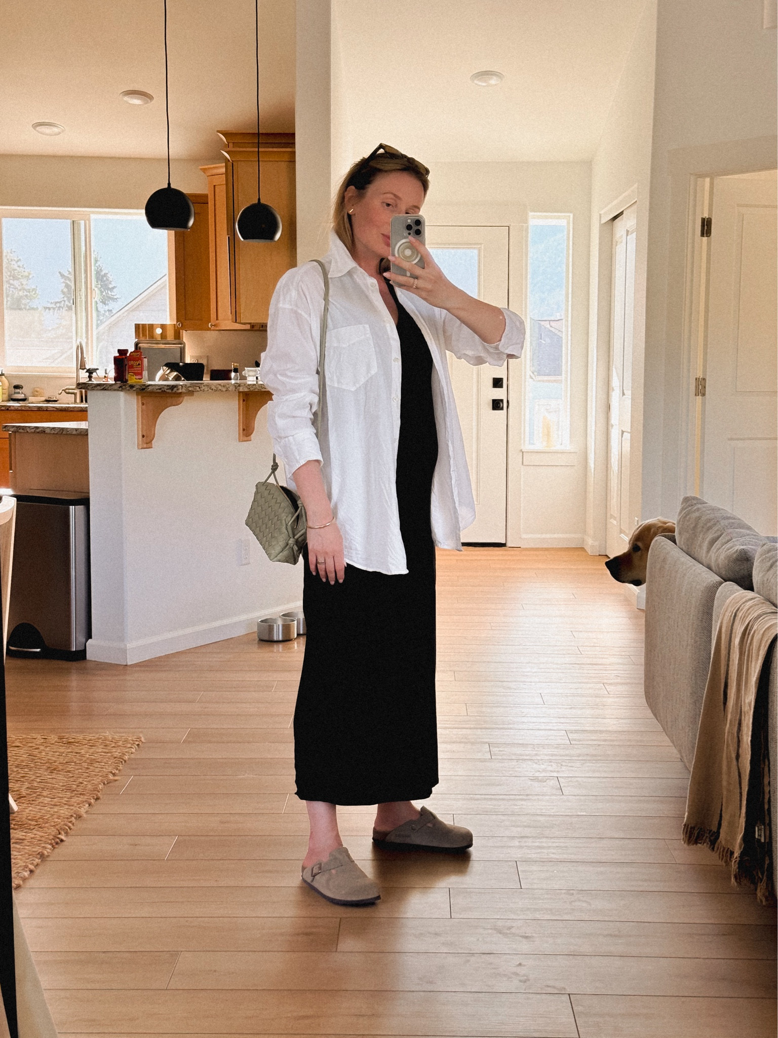 Late summer - early Fall outfit:
Birkenstock Boston clogs + black midi dress + oversized cotton shirt (Gant) + Bottega Veneta loop camera bag. 

#LTKStyleTip #LTKFindsUnder100 #LTKSeasonal