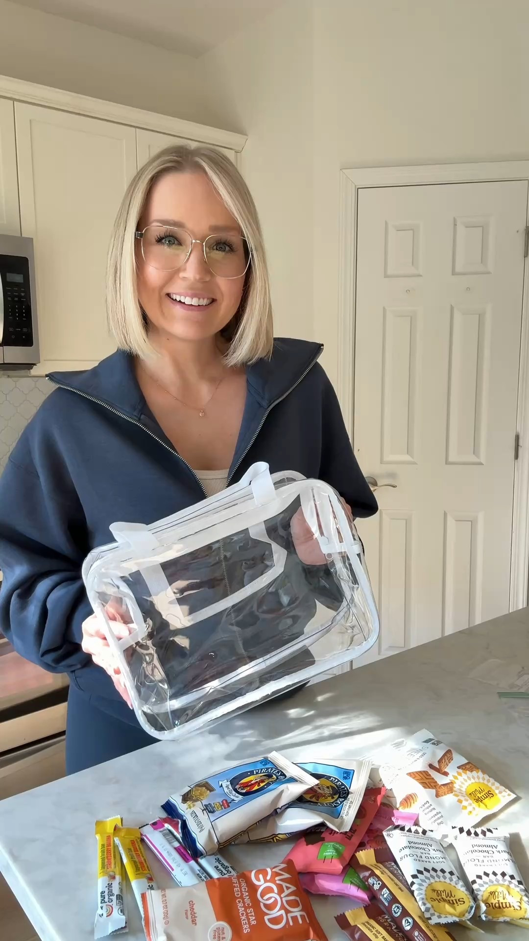 I needed something I could easily take in and out to the car and on the go for snacks. This bag is so good, simple, and the kids can see everything when they pick one so snacks don’t end up getting dumped out 😜. I’m so happy with this affordable find!

#LTKmomlife #LTKKids #LTKootd