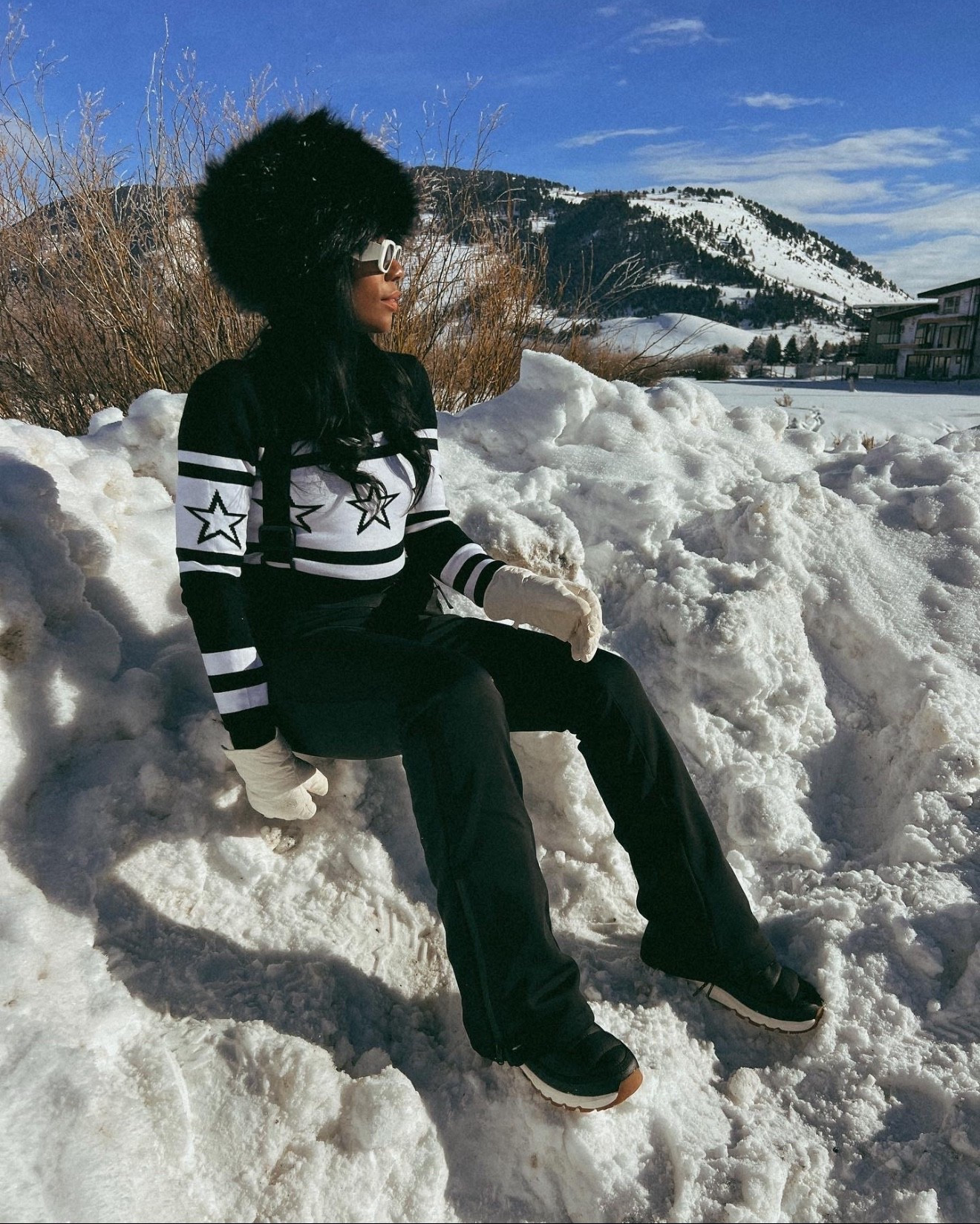 Black fur bucket hat, star turtleneck ski sweater, ski pants 

#LTKootd #LTKTravel