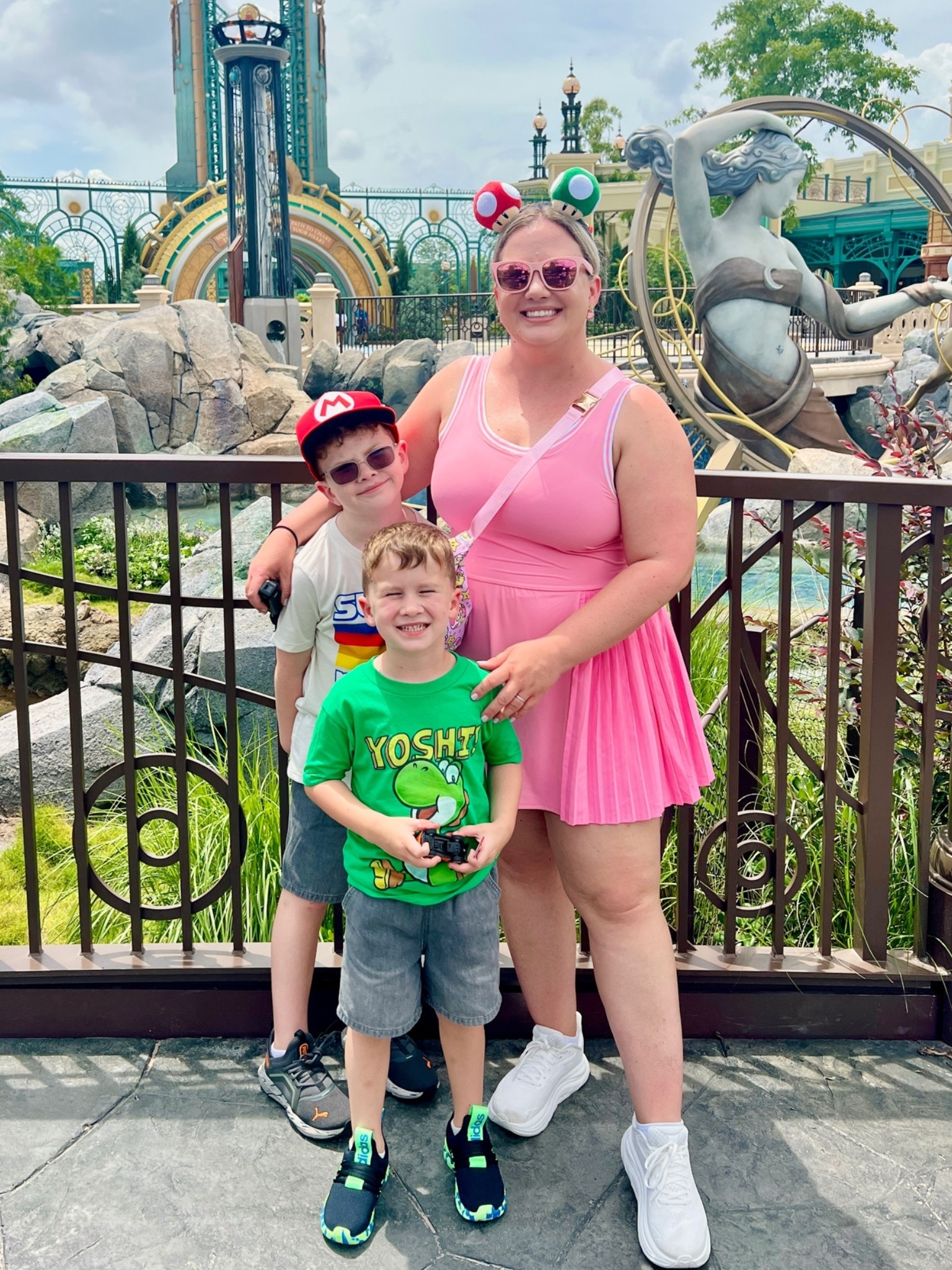 Love this athletic dress with removable shorts for theme park days! It was perfect for taking the family to Epic Universe. The boys love Super Nintendo world, so I had to bound as Princess peach. Pink athletic dress. Epic universe family outfits. Mario boy shirt. Yoshi shirt for kids.

#LTKTravel #LTKKids #LTKMidsize
