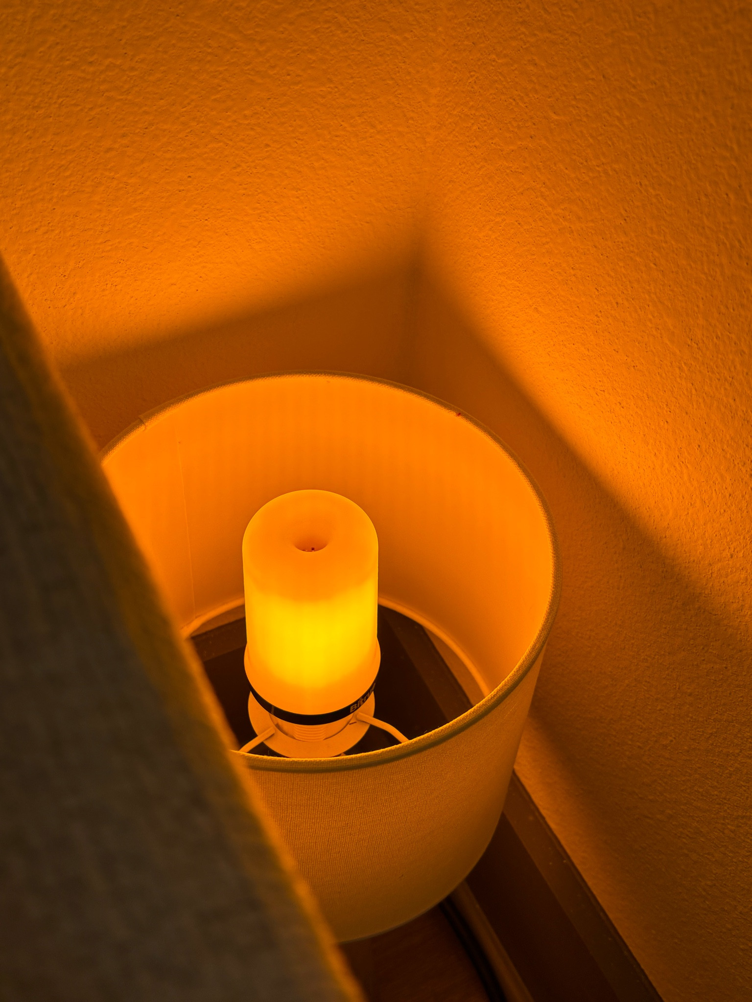 One of my ways to add cozy mood lighting to my living room! Used an old lamp I had, and an orange fire light bulb. Pop them behind a chair or couch!  🧡🍊🎃🦁🍑🏵️🧶 Gives the softest orange glow  

#LTKFindsUnder50 #LTKSeasonal #LTKHome