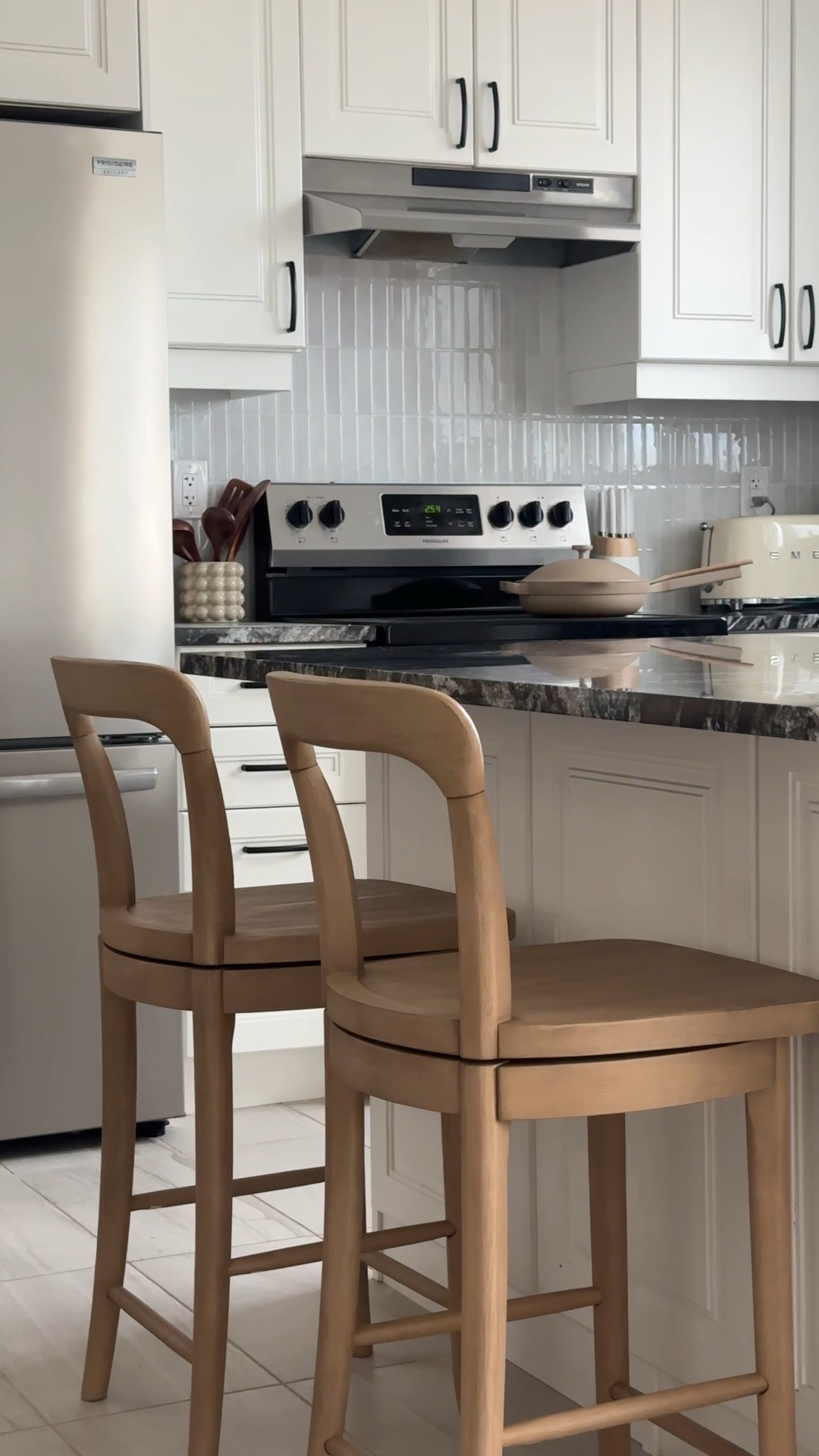 barstool upgrade 🤎 light oak swivel counter stools - kitchen inspo 