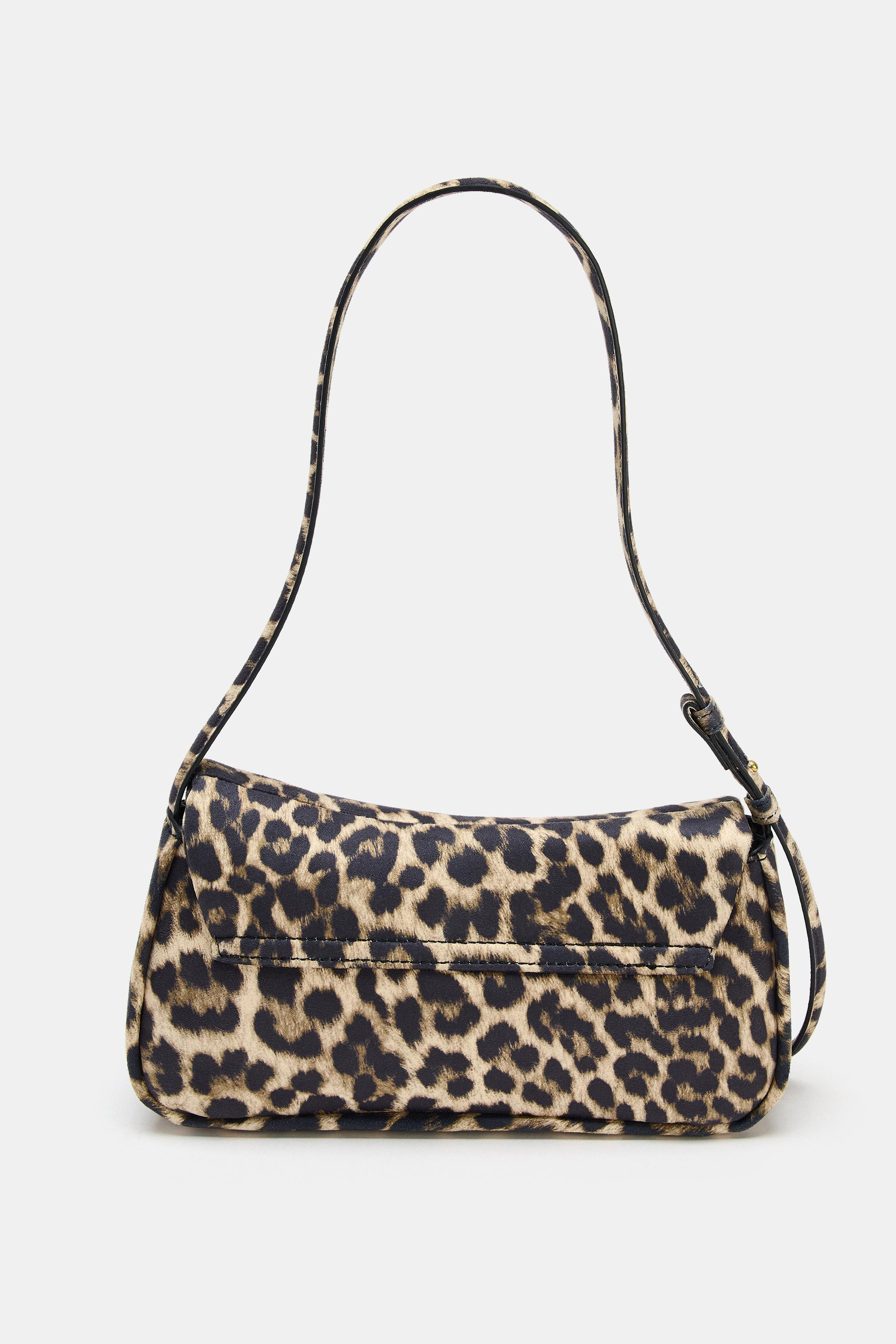 Shoulder bag. Printed top. Adjustable shoulder strap with metal embellishments. Interior zip pock... | Zara UK