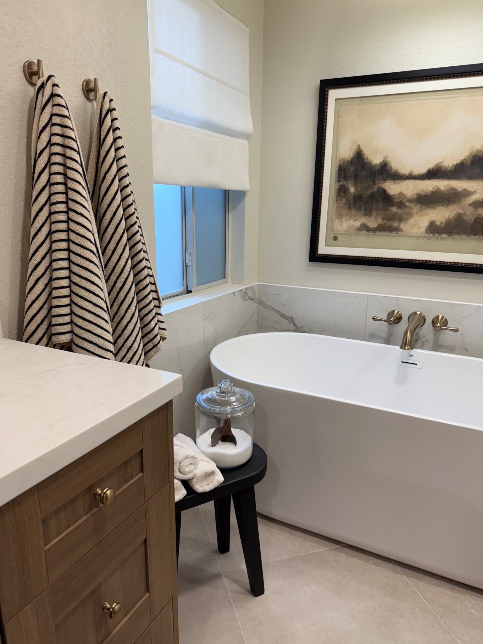 Upgraded the towels in our master bathroom to these 100% cotton thin striped bath towels 🤩 I love the subtle pattern and how it complements the art

I found these towels at HomeGoods! But I linked a few similar options  
•
•
Towels, bath towels, soft towels, organic cotton towels, cotton bath towel, hand towel, bathroom, master bathroom, bathroom design, freestanding tub, soaking tub, luxury bathroom, neutral bathroom, primary bathroom, bathroom decor, bathroom stool, Roman shade, towel hanger, towel hooks 


#LTKFindsUnder100 #LTKHome #LTKselfcare