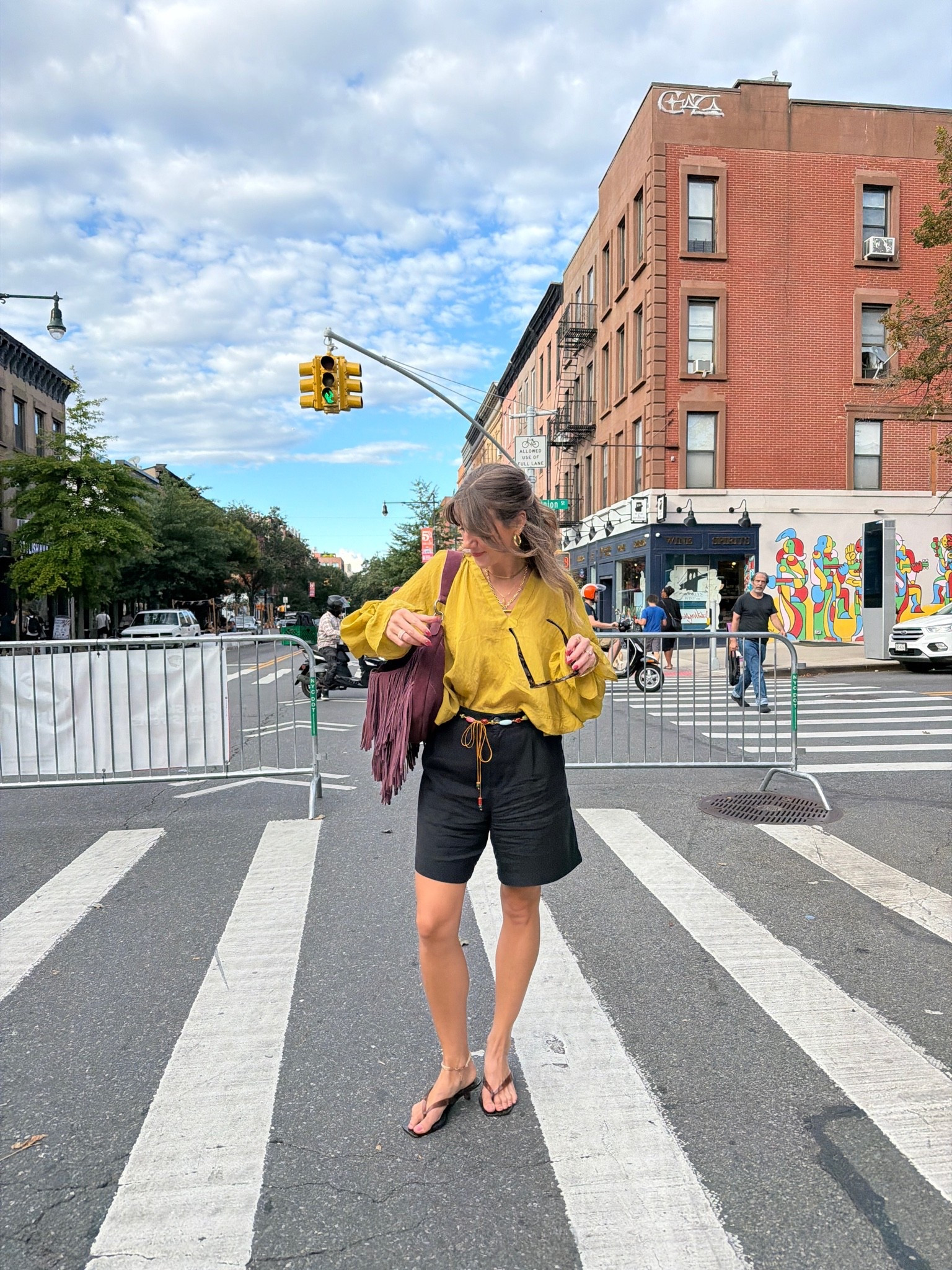 Night out in NYC! This purple fringe suede hobo bag is my new personality. Love the color combo with the chartreuse top too!