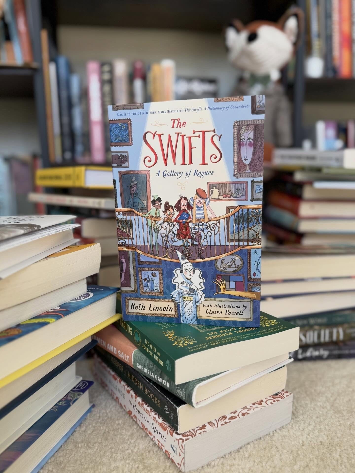 Book 5 of 2026 ⭐️⭐️⭐️⭐️⭐️

The Swifts: A Gallery of Rogues 📚 By: Beth Lincoln 

“Shenanigan never lied. She merely told version of the truth.”

An absolutely delightful middle grade mystery starring Shenanigan and her wonderfully eccentric family. This time, Shenanigan heads to Paris - where an art heist awaits, cousins and extended family abound (but are not to be trusted) and, naturally, chaos follows.

The second book in the Swifts series is mysterious, cozy, and full of heart. Between capers and cleverness, it delivers a lovely message about embracing who you are and accepting others exactly as they come.

In the Swift family, every child is brought before the dictionary and given both a name and a definition—hence Shenanigan.
If you were part of the Swift family, what would your name be… and what kind of trouble would you get into?

#bookstagram #FiveStarRead #MiddleGradeMagic #TheSwifts #BethLincoln