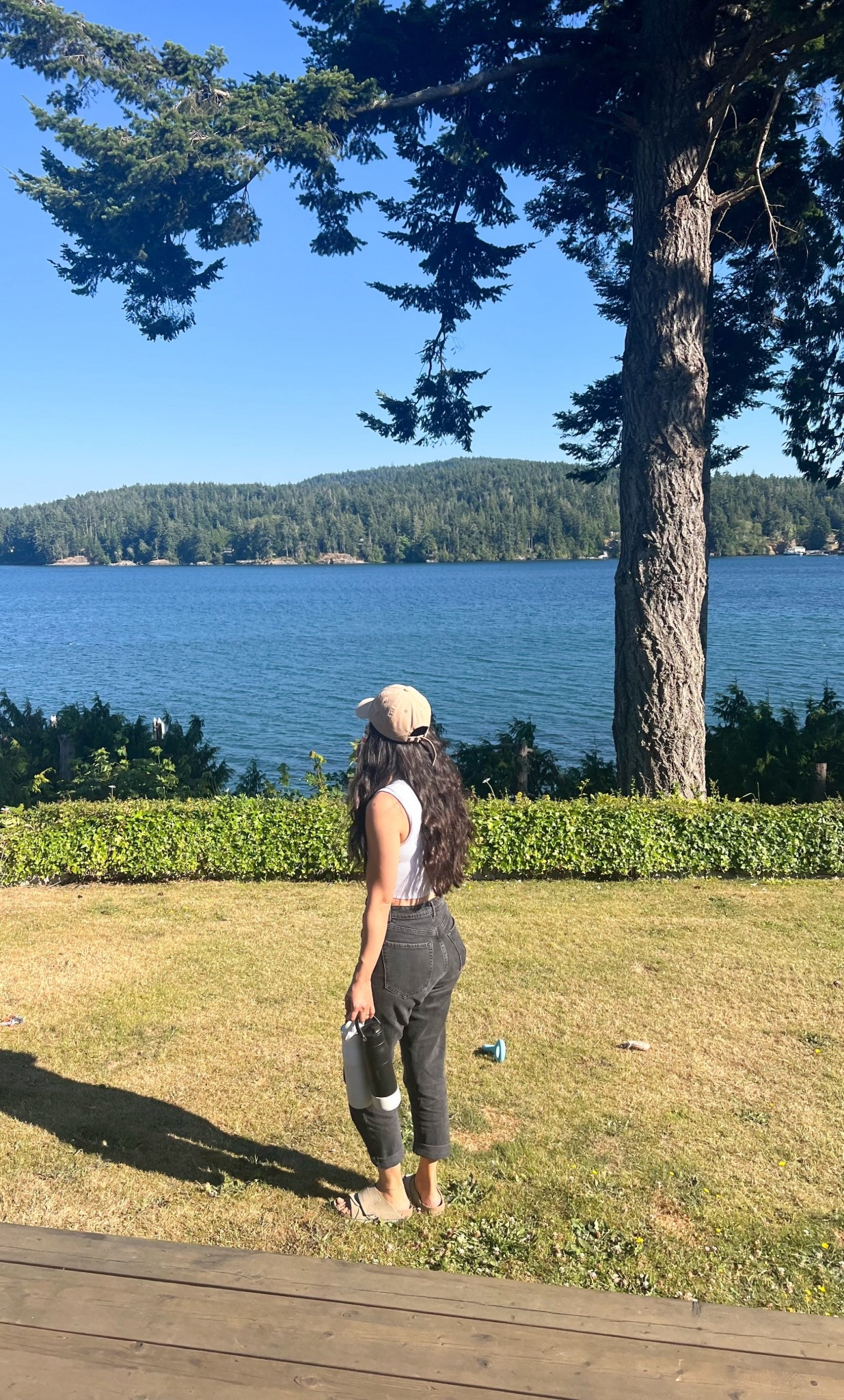 Savor the delightful warmth of the sun on your skin as you sip refreshing water, taking a moment to soak in the breathtaking view that surrounds you.

#LTKtravel #LTKsummer #LTKcanada