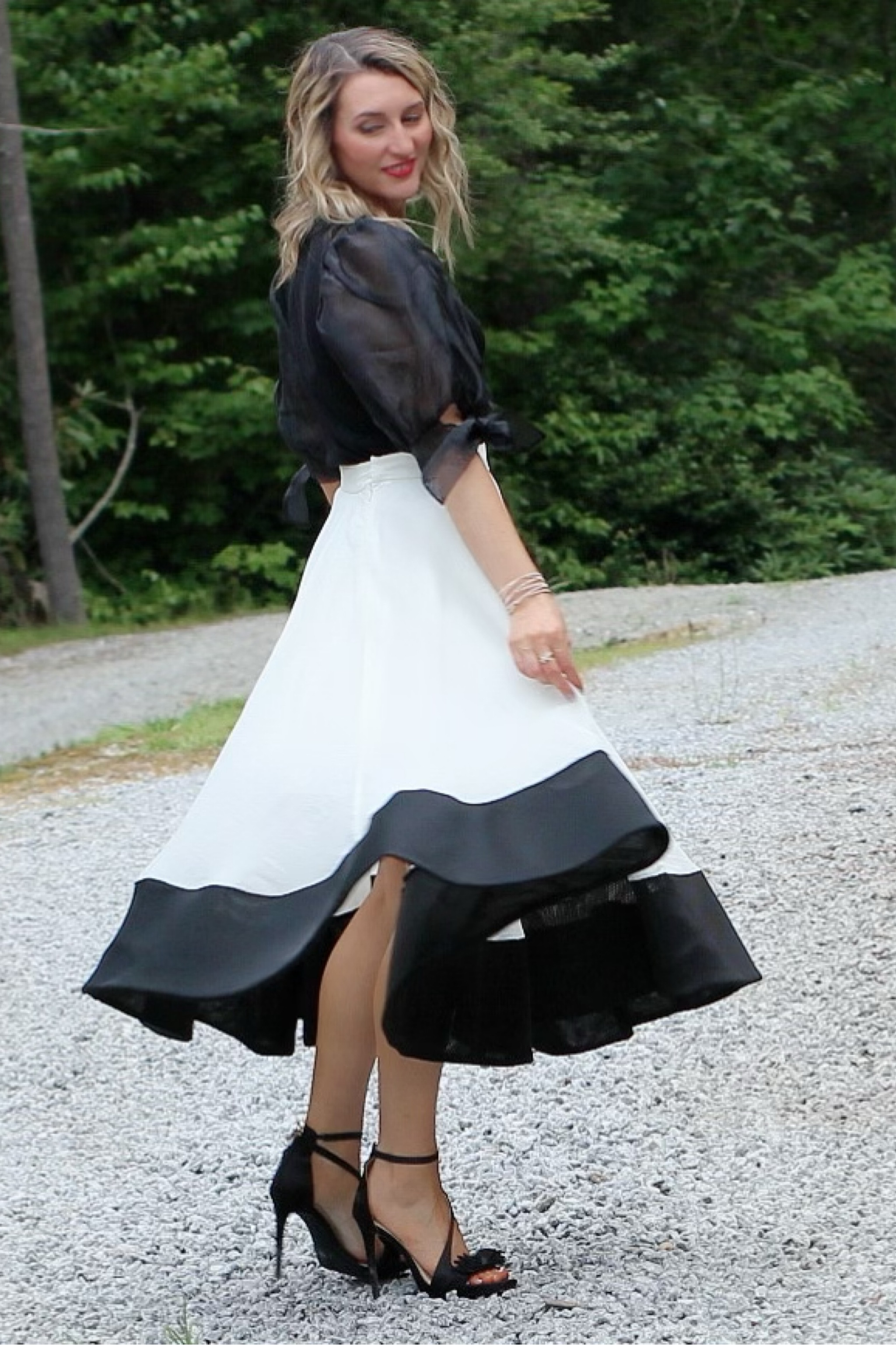 Still one of my most favorite outfits. Even though this photo is a couple of years old, the outfit is still available!

Is it a little fancy for work? Maybe so. But I love it so I wear it anyway haha. It’s honestly perfect for an event or whatever makes you feel good. I’m a firm believer that you should wear what makes you happy. 

True to size, I’m in a small in the skirt and top. 

Organza Skirt | Puff Sleeve Top | Event Outfit | Feminine Outfit | Statement | Fashion | 

#LTKFind #LTKstyletip #LTKunder100