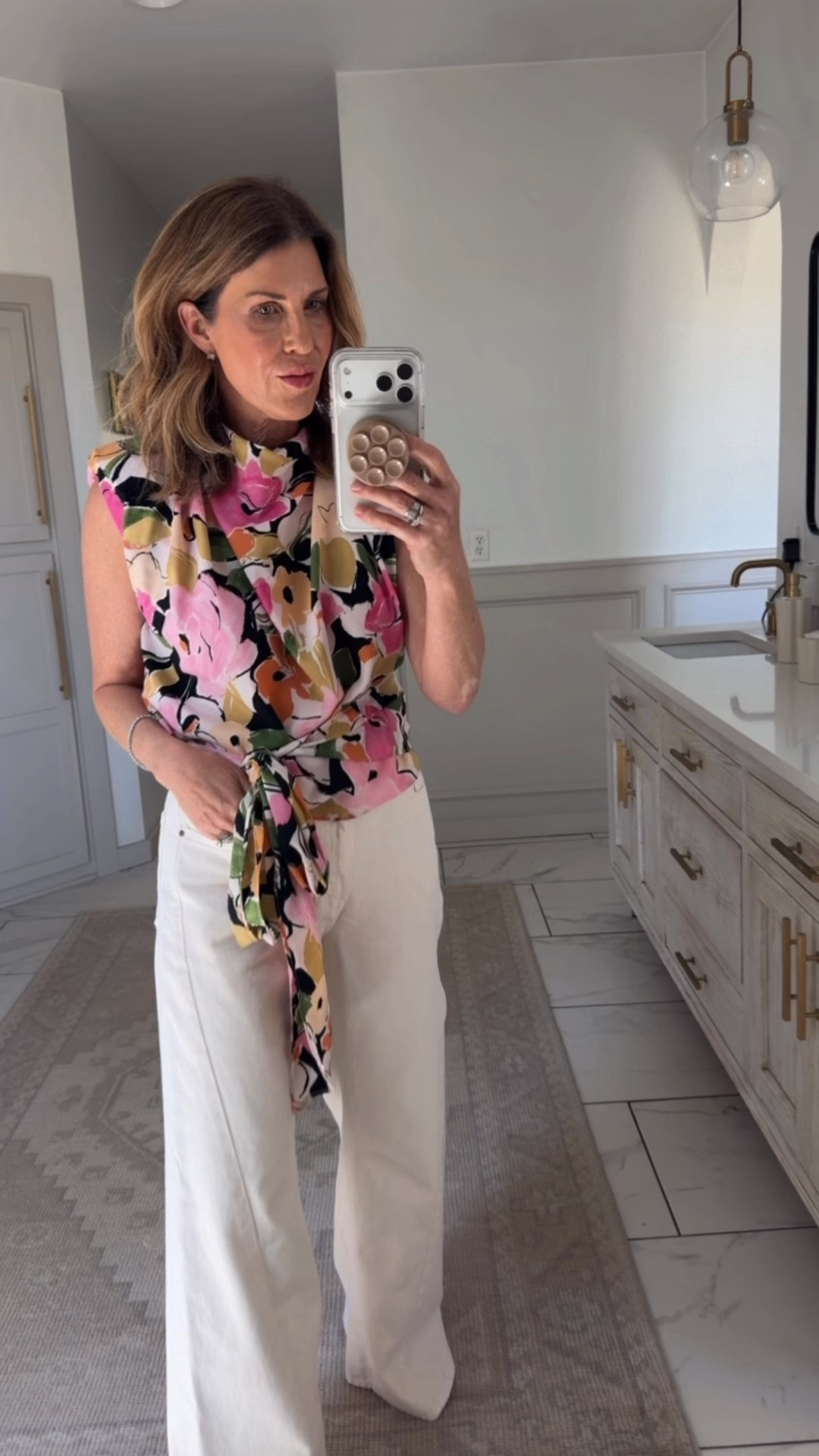 Love this floral blouse. I’m in a small and a size 27 lemon twist denim 

#LTKOver40