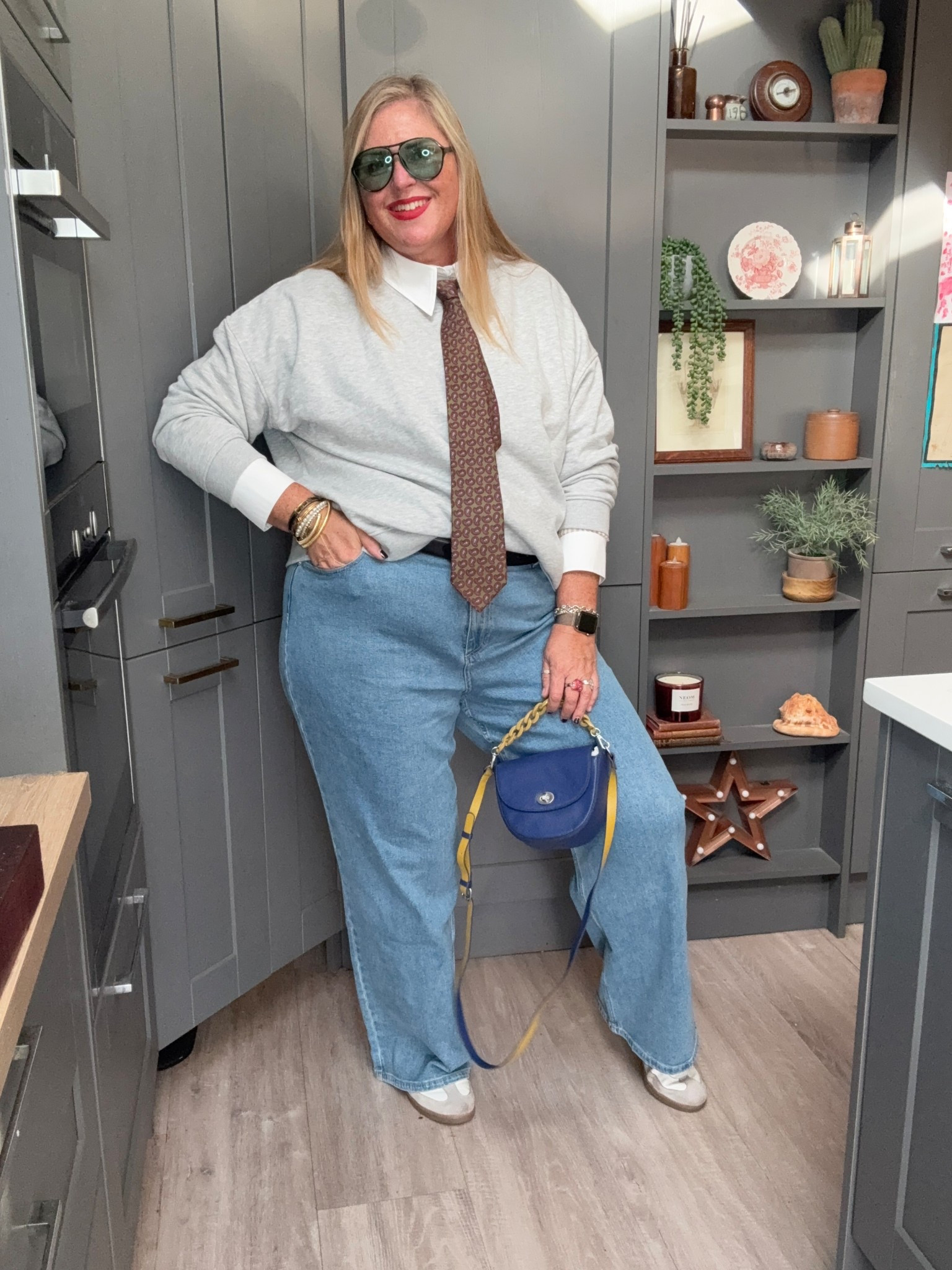 Grey sweatshirt, shirt, wide leg jeans, trainers, blue bag, tie, black belt, sunglasses 

#LTKplussize #LTKcurves #LTKautumn