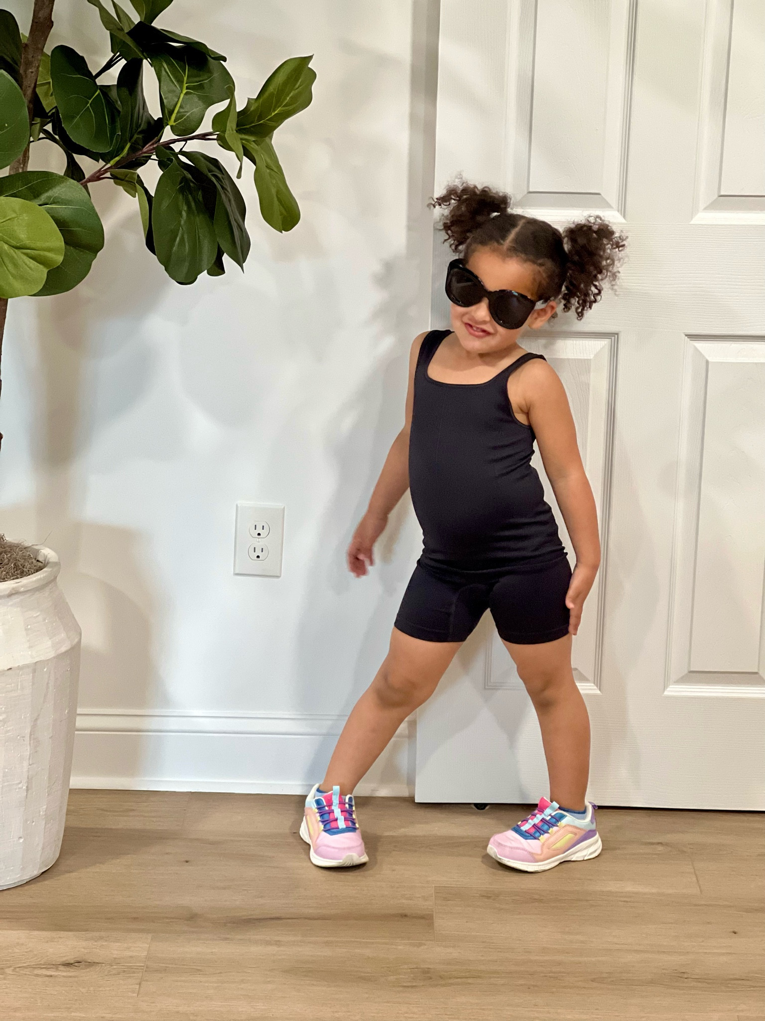Toddler girl athleisure wear, bodysuit , leotard, sneakers. Oh, she’s wearing mommy’s glasses🤣

#LTKkids #LTKActive #LTKfindsunder50