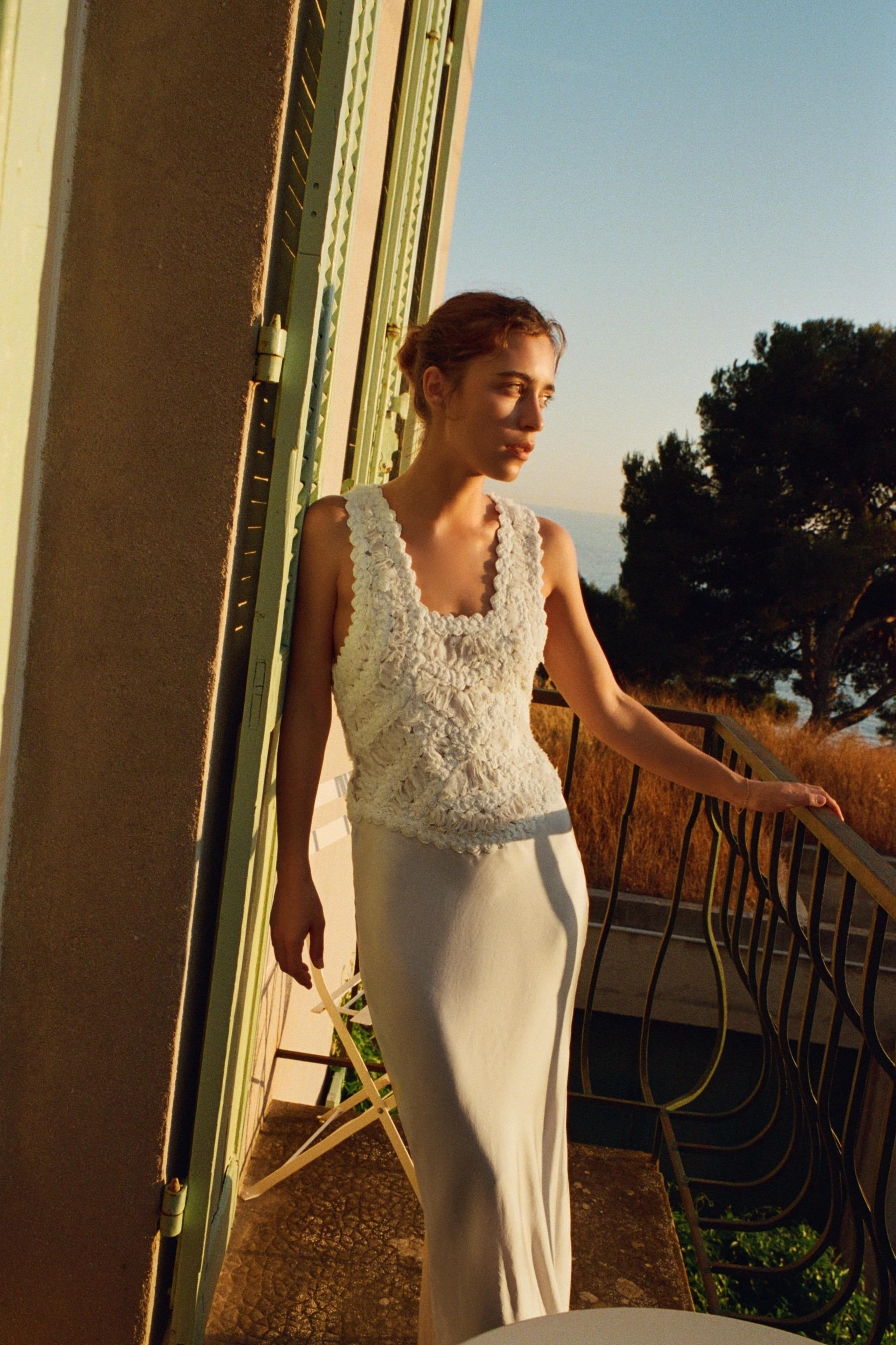 Long combination dress made of a viscose blend and crochet fabric. Square neckline and wide strap... | Zara US