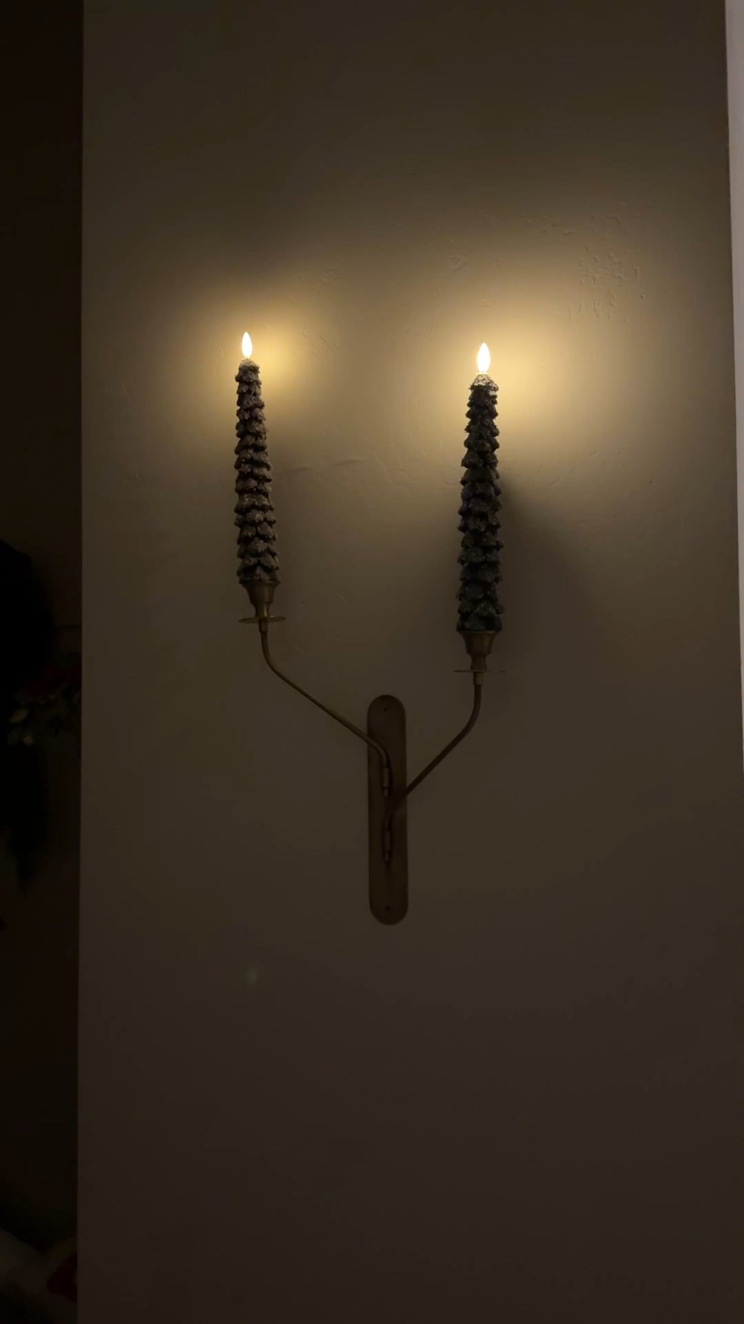 add a little holiday to our candle sconce with these battery operated taper candles that come with a remote!! So festive! 

#LTKHoliday #LTKHome