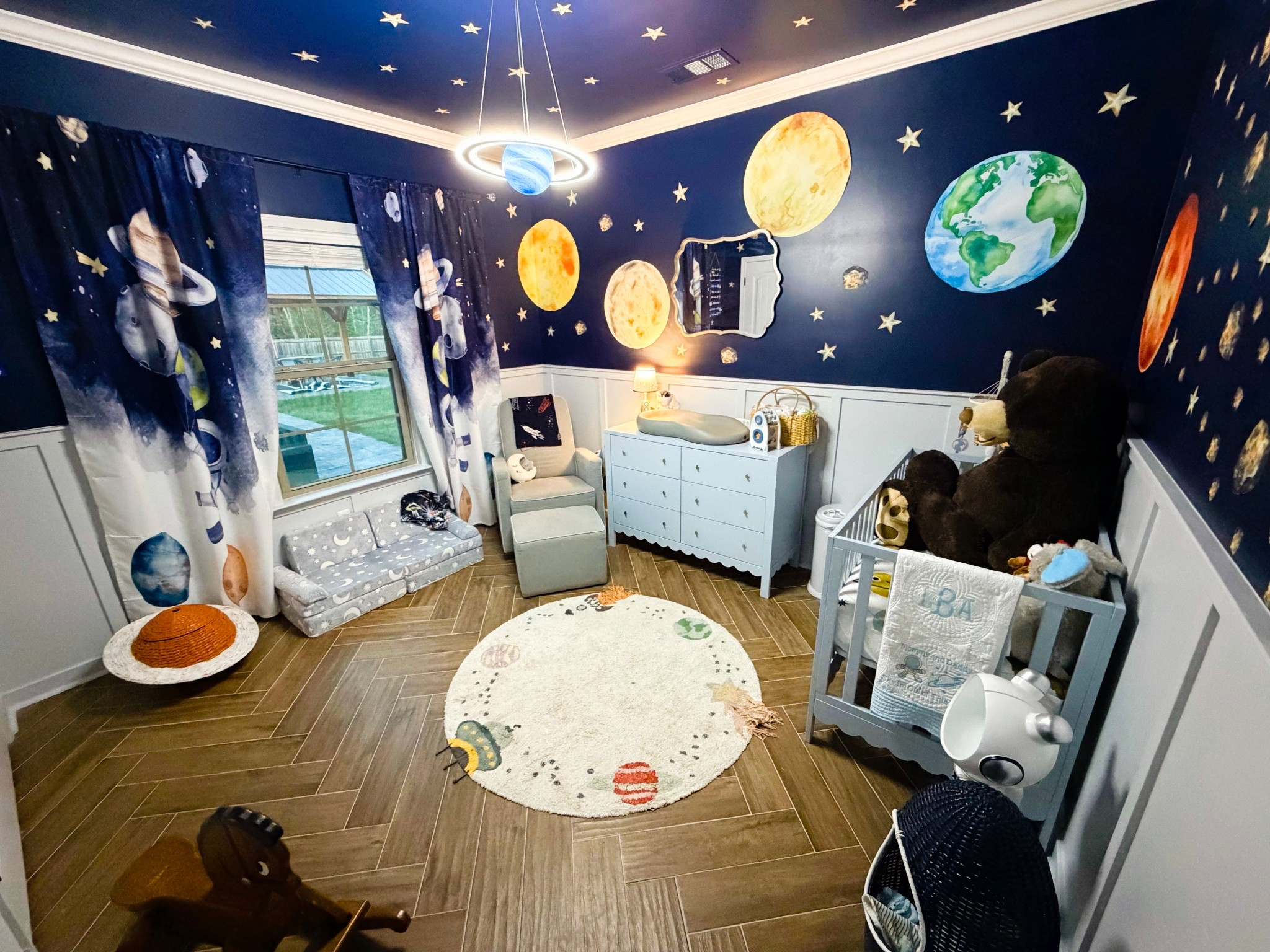 Had such a fun time putting together our baby’s space themed nursery. The wall decals are a size large and I purchased extra stars for the ceiling 

#LTKBaby #LTKBump #LTKmomlife