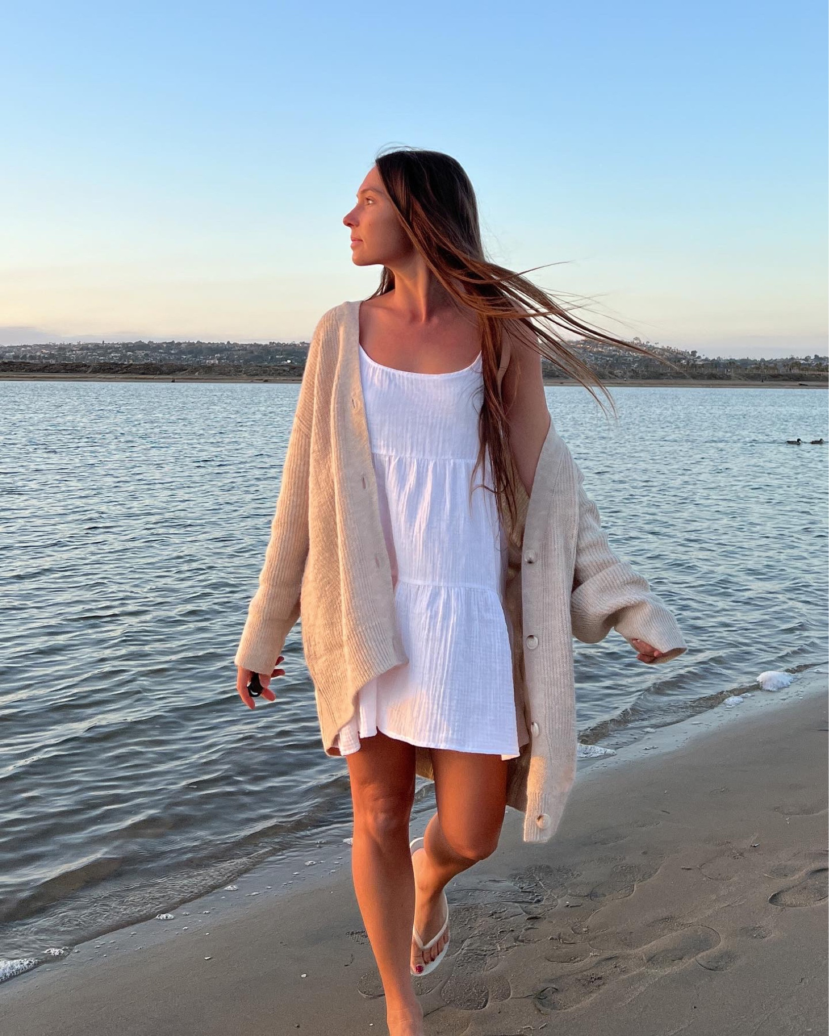 Cozy and fuzzy brown sweater from Target. White beach dress from Target. Fall transition outfit, fall beach outfit, beach style, beach dress, sweater outfit. 

#LTKGiftGuide #LTKSeasonal #LTKunder50