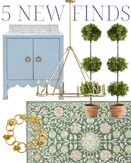 Blue scalloped vanity, lit boxwood topiary, outdoor topiary, brass candle chandelier, green rug, floral rug, gold bracelet, Tuckernuck, Ballard, Serena and Lily, Pottery Barn

home decor | decor inspiration | decor inspo | living room | bedroom | coffee table | grandmillennial home | grandmillennial style | classic home | classic style | southern home | southern style | coastal living | southern living | southern charm | beach house | blue and white | chinoiserie | classics | traditional home

#LTKhome