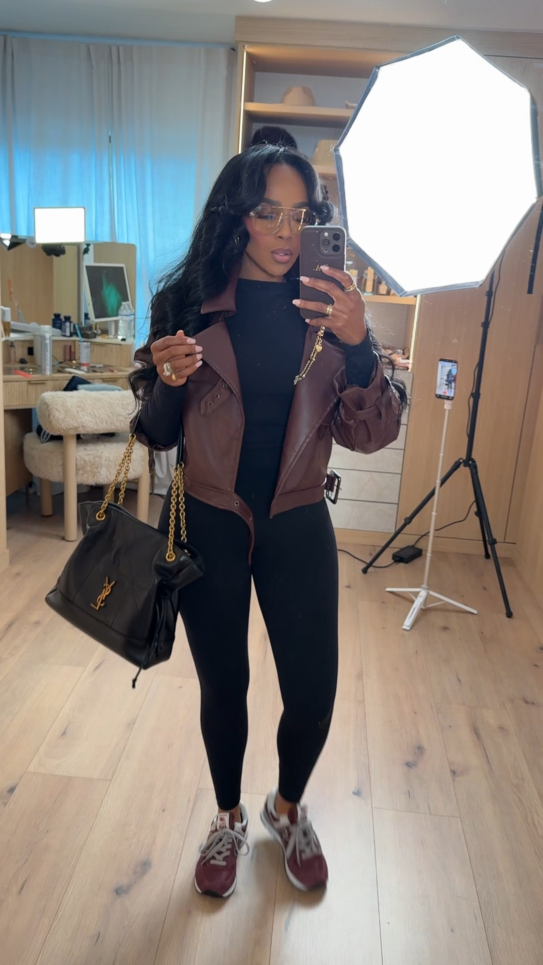 Casual but elevated 🤎  
This is one of my go-to looks when I want to be comfortable but still feel put together. Easy layers, clean neutrals, and sneakers that can handle a full day on the go.

Perfect for running errands, travel days, casual lunches, and everyday wear.

📏 Sizing & Fit:  
Top: Size Small  
Jacket: Size Small  
Leggings: Size Small  
Sneakers: True to size  

Styled multiple ways so the cost per wear really drops — a solid long-term shopping strategy for everyday outfits.

Tap to get details and shop this look.

Follow me on Instagram and YouTube @k