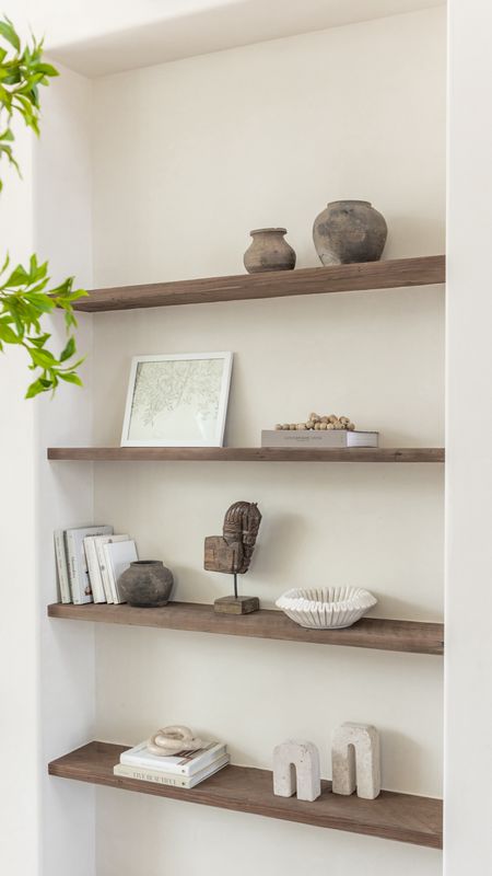 Sharing more about styling these shelves over on IG today! Linked my faves and similar since some are vintage!! Get the look! 

#entry #shelves #shelfstyling #decor

#LTKSeasonal #LTKsalealert #LTKhome
