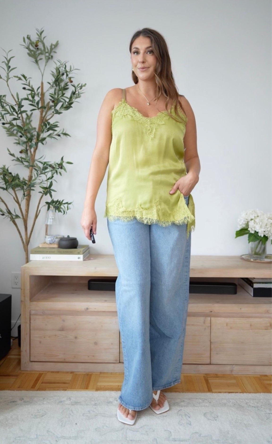 The prettiest pop of green 💚 This lace-trim cami with relaxed denim is such an easy way to dress up everyday jeans without feeling overdone.

green lace cami, satin cami outfit, wide leg jeans, casual date night outfit, size 14 outfit, size large style, feminine fall outfit, jeans and heels, elevated casual style

#LTKSaleAlert #LTKSeasonal #LTKMidsize