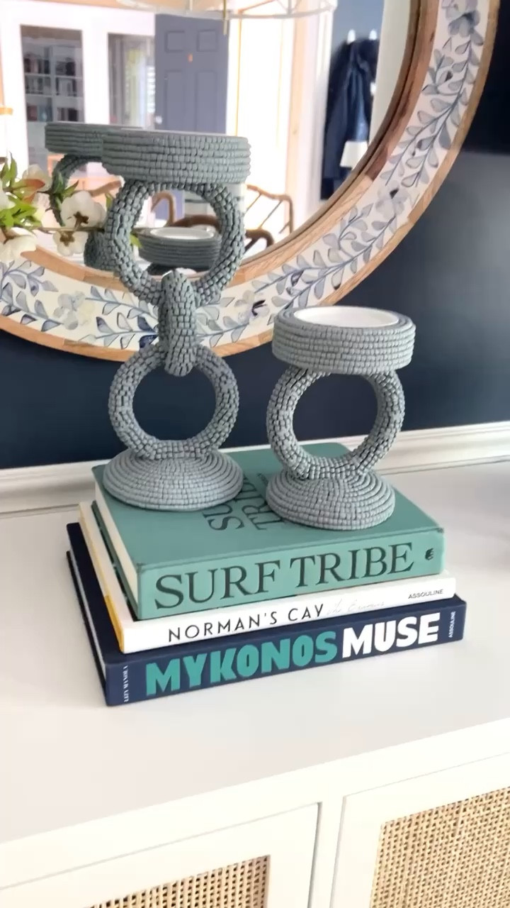 Love these blue candle holders that add a touch of coastal charm to your space! Styled with my coastal Coffee table books and white Console table
8/1

#LTKStyleTip #LTKHome
