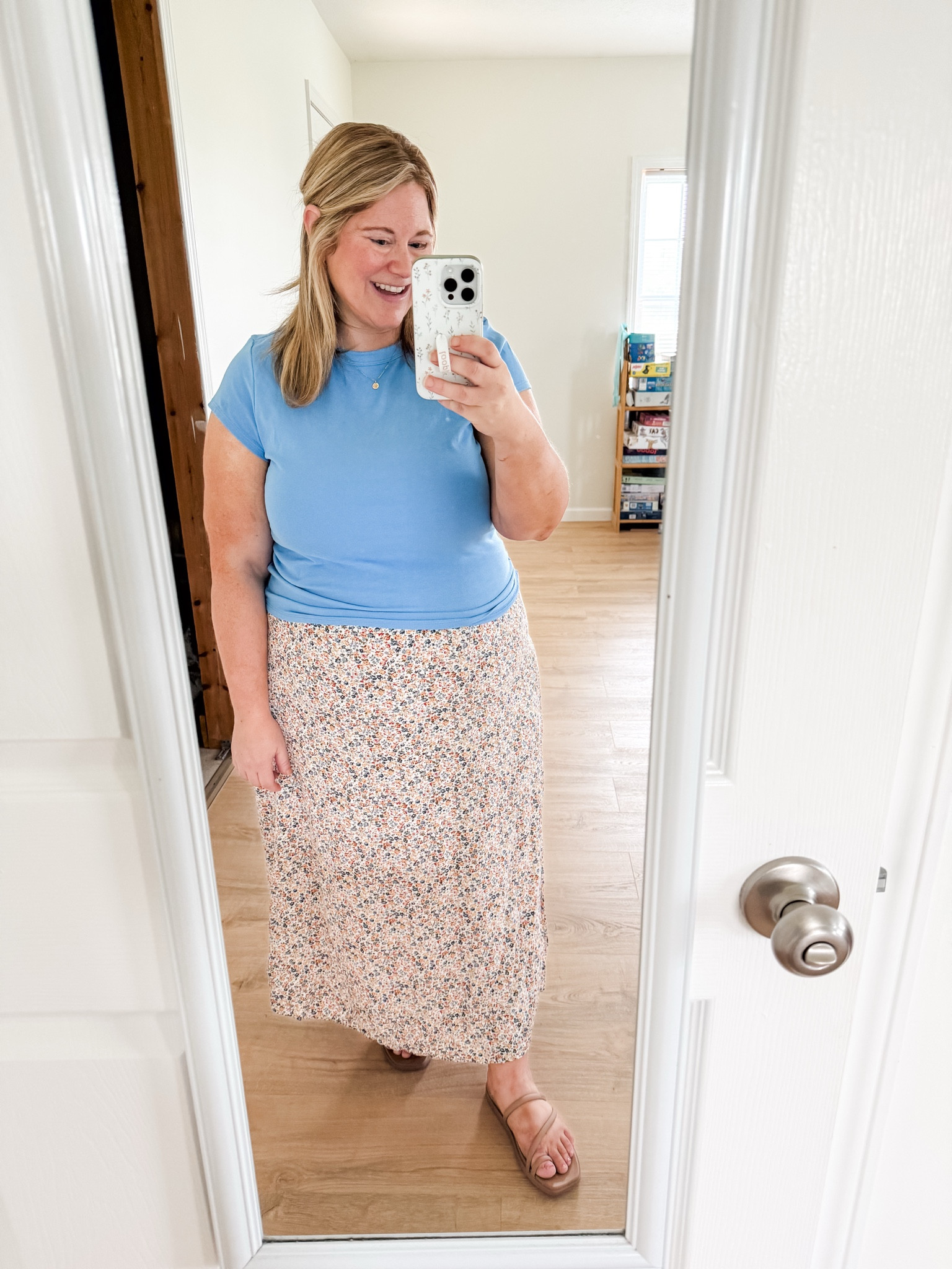 Wearing an XL in my tee and floral skirt.

#LTKmomlife #LTKBump #LTKMidsize