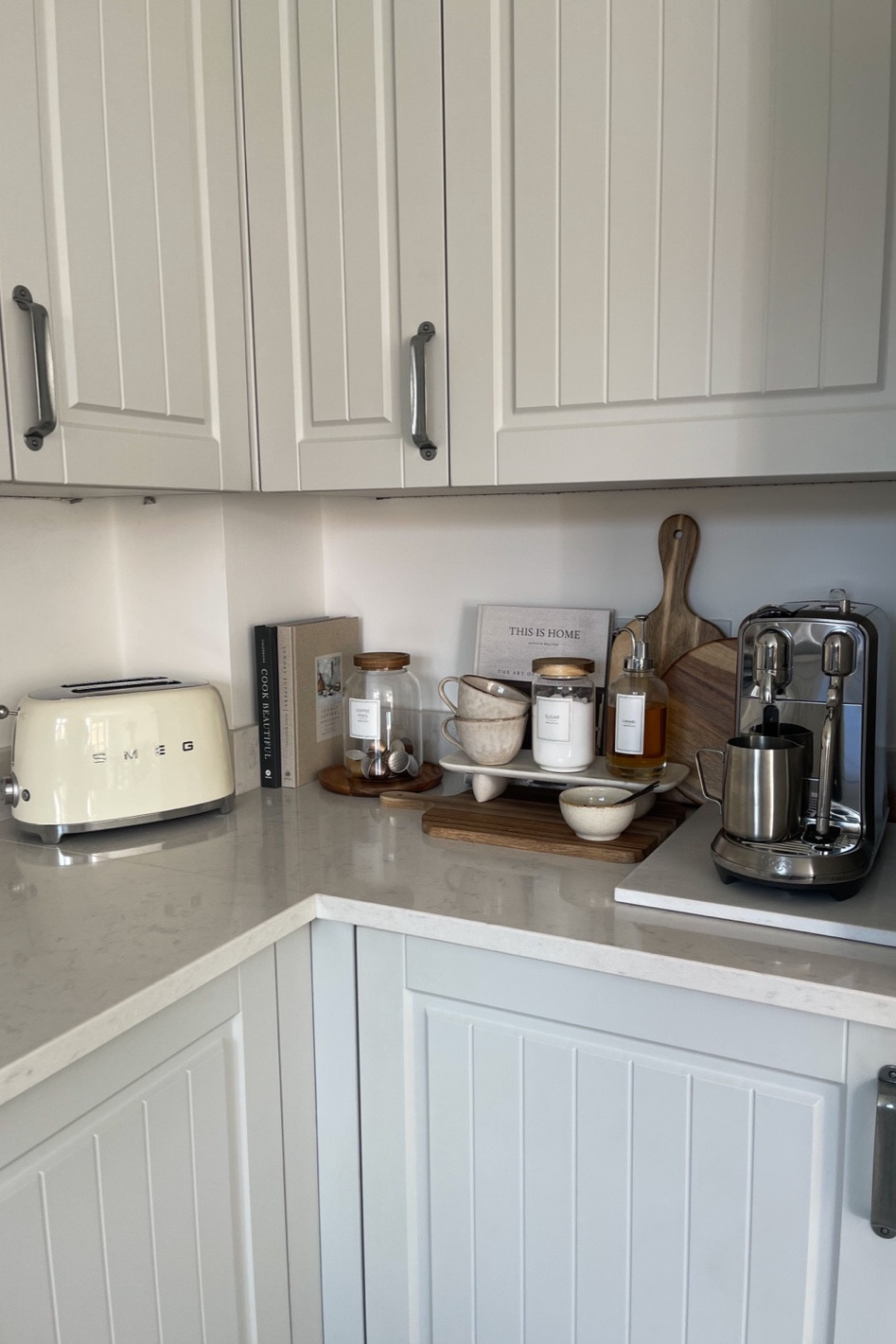 Our little coffee corner ☕️🤍

Coffee machine, kitchen countertop styling, decor books, home decor, kitchen decor, amazon home, smeg toaster, wooden chopping board, kitchen canisters, glass canisters 

#LTKhome #LTKstyletip #LTKFind