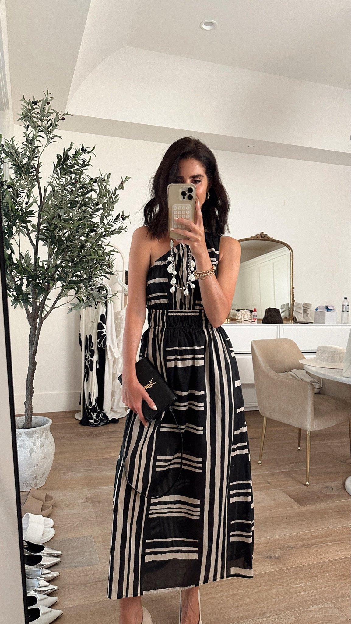 This dress can be dressed down with sandals, but I dressed it up here with pumps and a designer crossbody bag. I'm just shy of 5-7" wearing the size XS #StylinbyAylin #Aylin 

#LTKSeasonal #LTKStyleTip