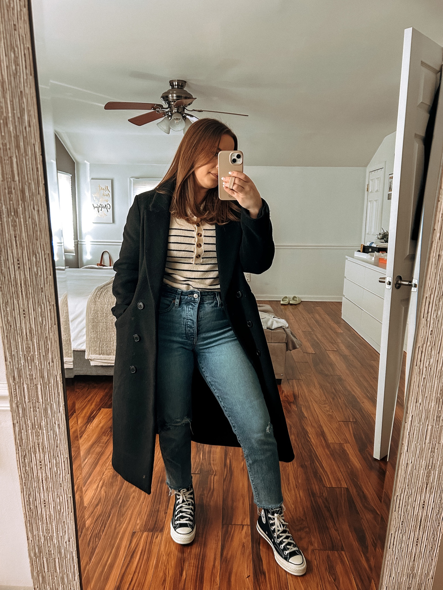 Black coat, black converse, striped sweater, blue jeans 

#LTKfit #LTKSeasonal #LTKstyletip