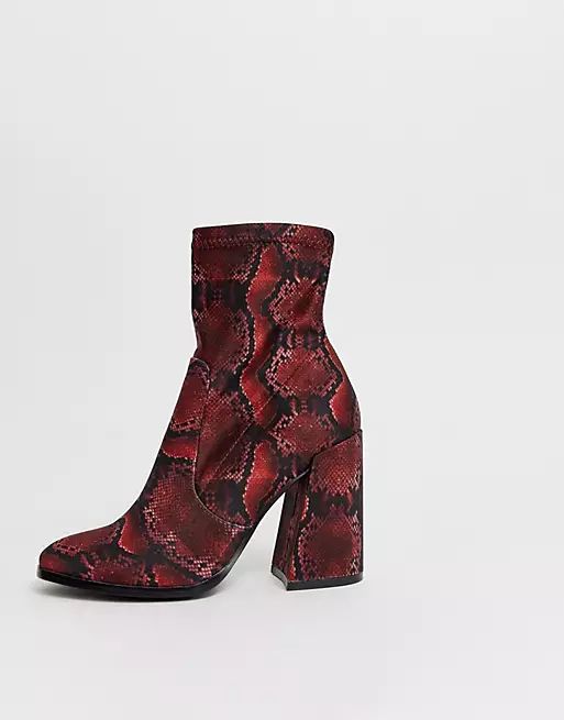 ASOS DESIGN Ellan heeled sock boots in snake | ASOS (Global)