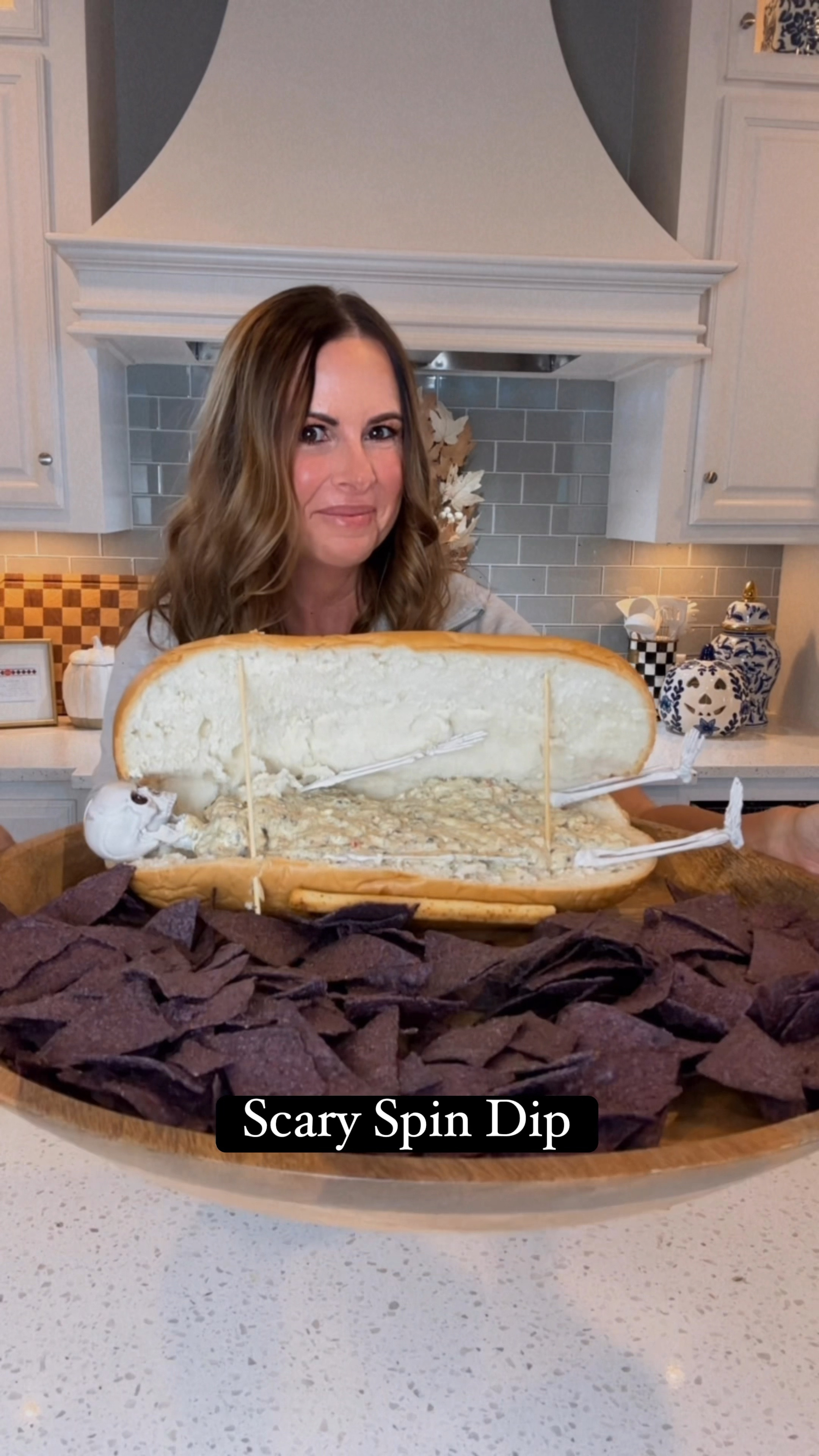 Knock ‘em dead with this scary spin dip at your next Halloween party💀! This turned out so fun and was so easy to make! You could use any dip obviously, but I kept it simple by using the Tostitos Spinach dip in a jar. I used 2 jars for this. I propped open the bread with wood skewers (I did have to break them to make them shorter) and I attached a crunchy breadstick with toothpicks for the handle. This took no time at all to make! 

Halloween party 
Halloween ideas 
Halloween food 
Serving tray 

#LTKHalloween #LTKParties #LTKHome