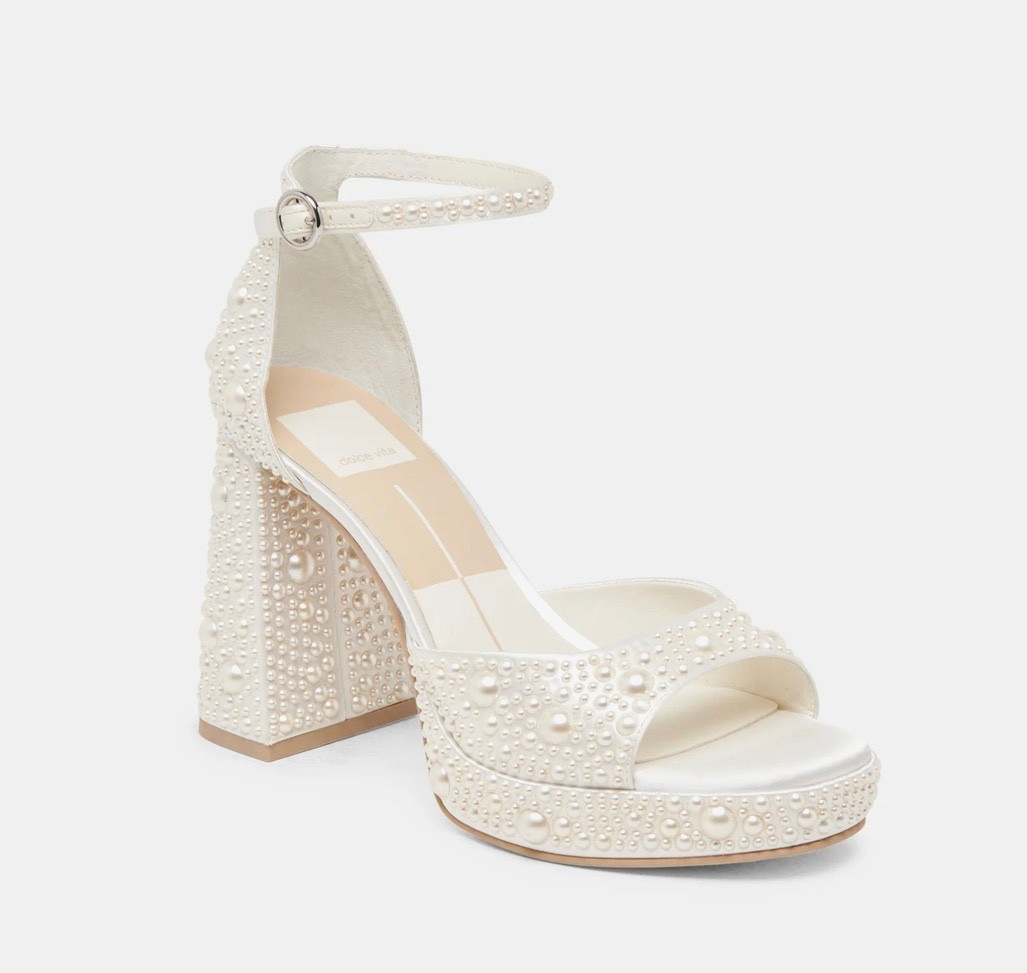 Pandro Pearl Heels True White Satin

Comfort, drama, and elegance come together to form perfection in PANDRO PEARL. This heel is coated in satin, adorned in dreamy pearls, and features a chunky block heel. Wedding-ready and sustainably-crafted, get ready add this pearly platform to the guest list

#LTKTravel #LTKWedding #LTKHome