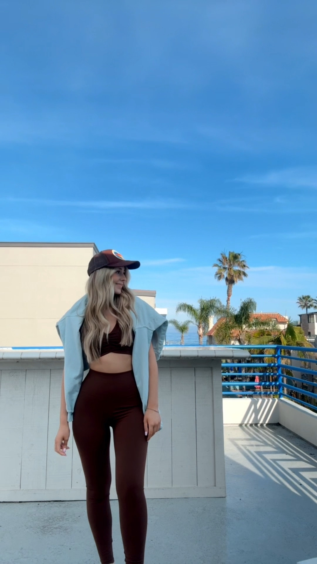morning walk look! love this set from beach riot so much 🩵🤎 

beach riot | chocolate brown set | brown workout set | revolve style | daily drills sweatshirt | aviator nation trucker hat | APL tennis shoes | san diego style | summer workout wear 