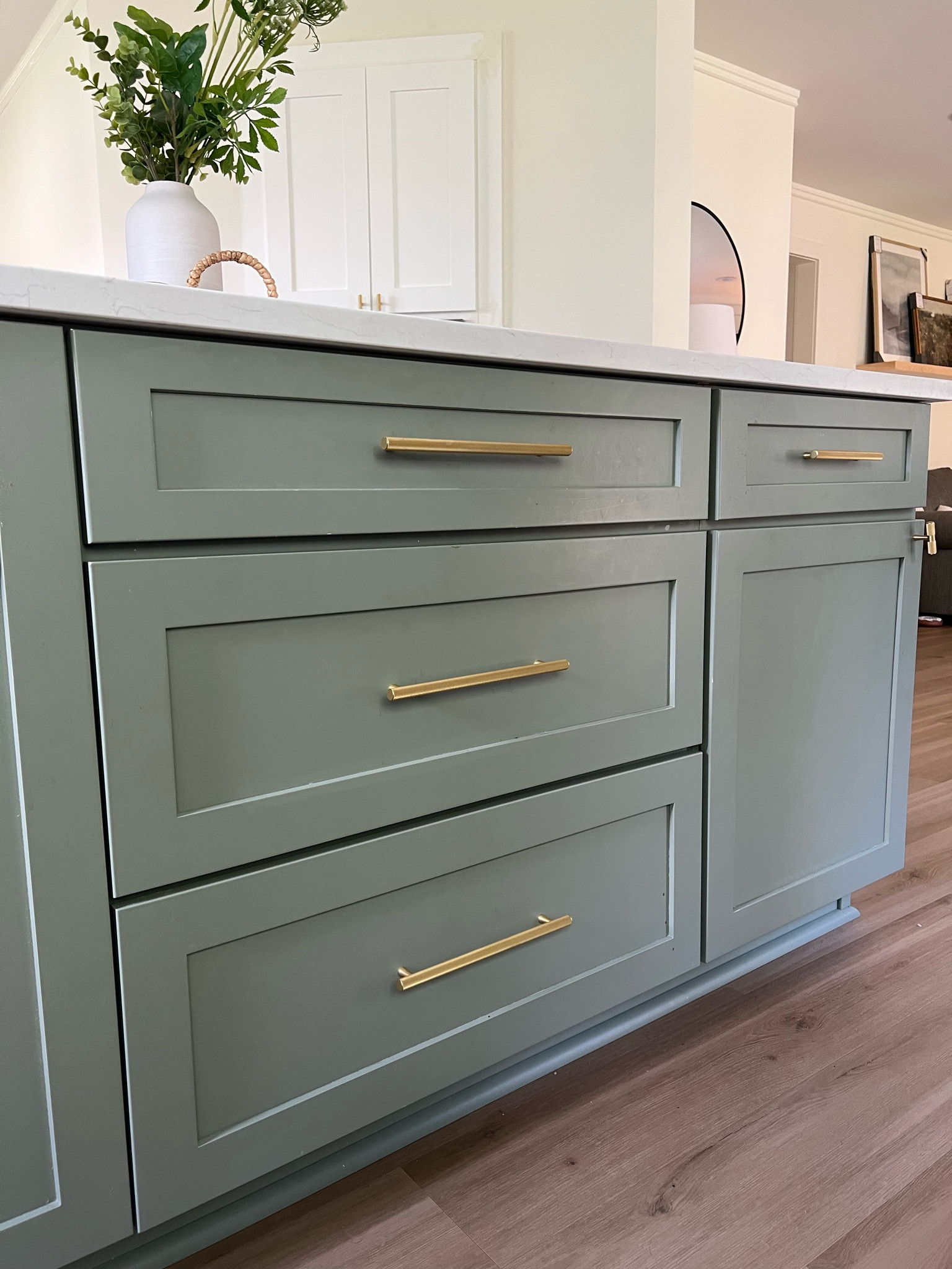 Solid knurled gold kitchen hardware

Evergreen fog cabinets, kitchen island, green paint colors, spring home decor, kitchen remodel, color of the year. 

#LTKFind #LTKhome #LTKstyletip