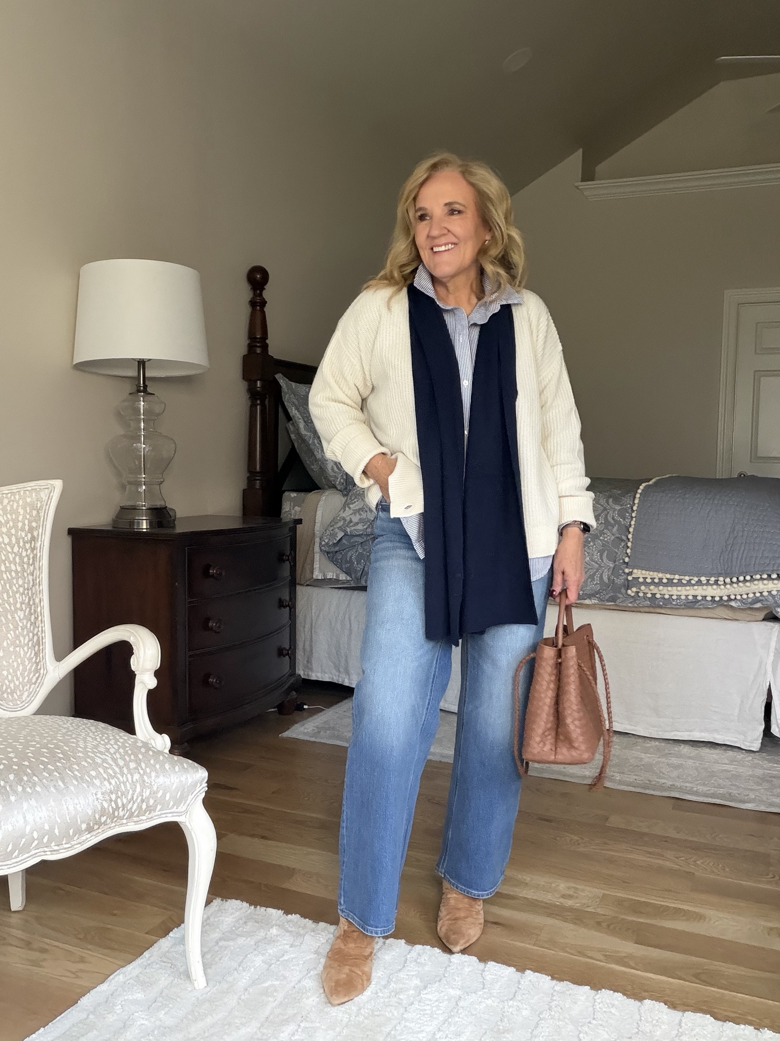 Cashmere sweater size medium
Blue and white striped poplin blouse for a relaxed fit size medium
The Bella jeans are restocked. They’re a relaxed straight leg. Order your regular size. I’m size 29 with an inseam 28.
Booties size up 1/2 

#LTKootd #LTKPetite #LTKOver40