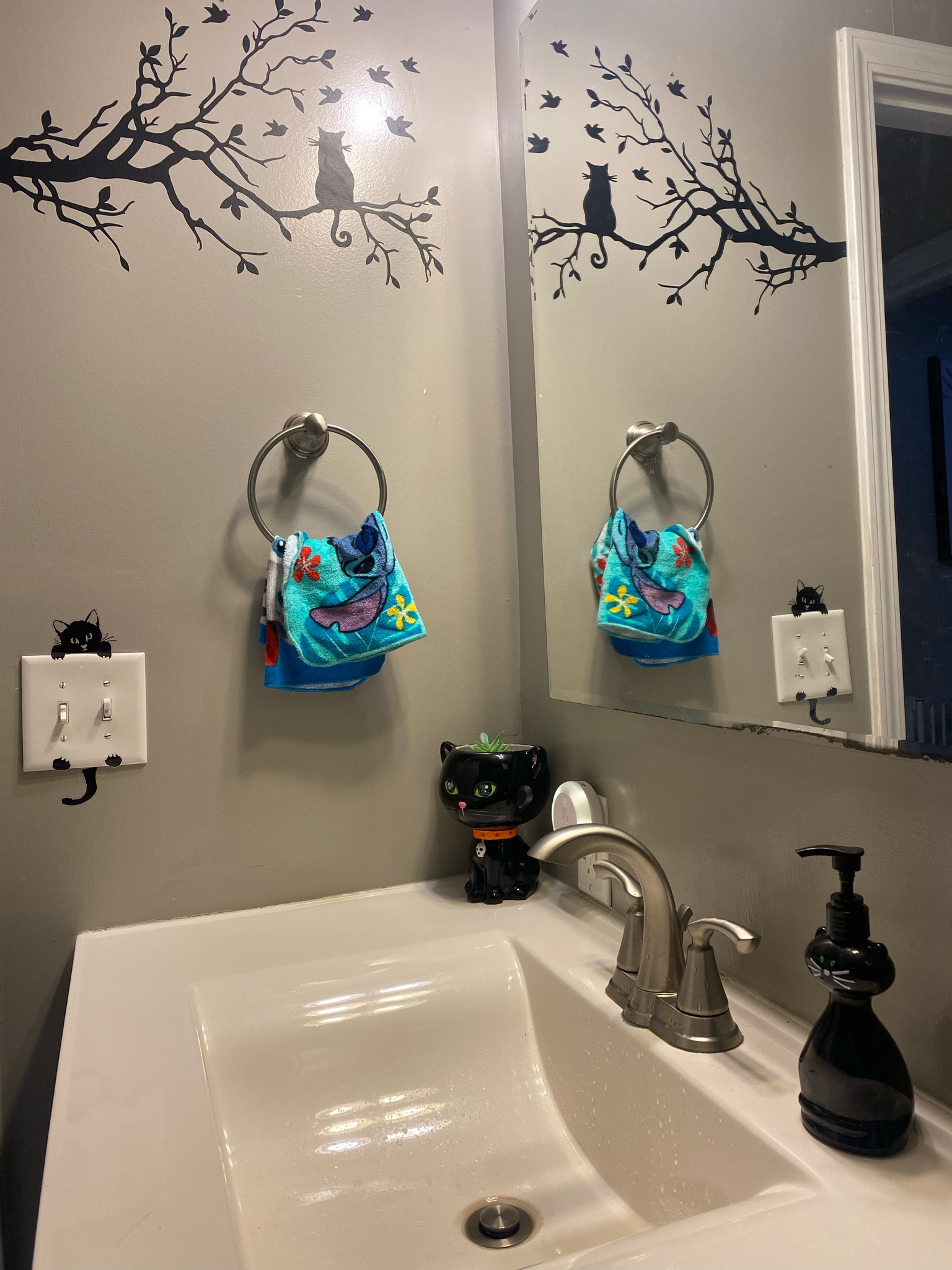 The kitty candy dish and soap dispenser were thrifted🖤 I posted the other side of the bathroom too with our shower curtain and some more stickers! 

#LTKhome #LTKstyletip