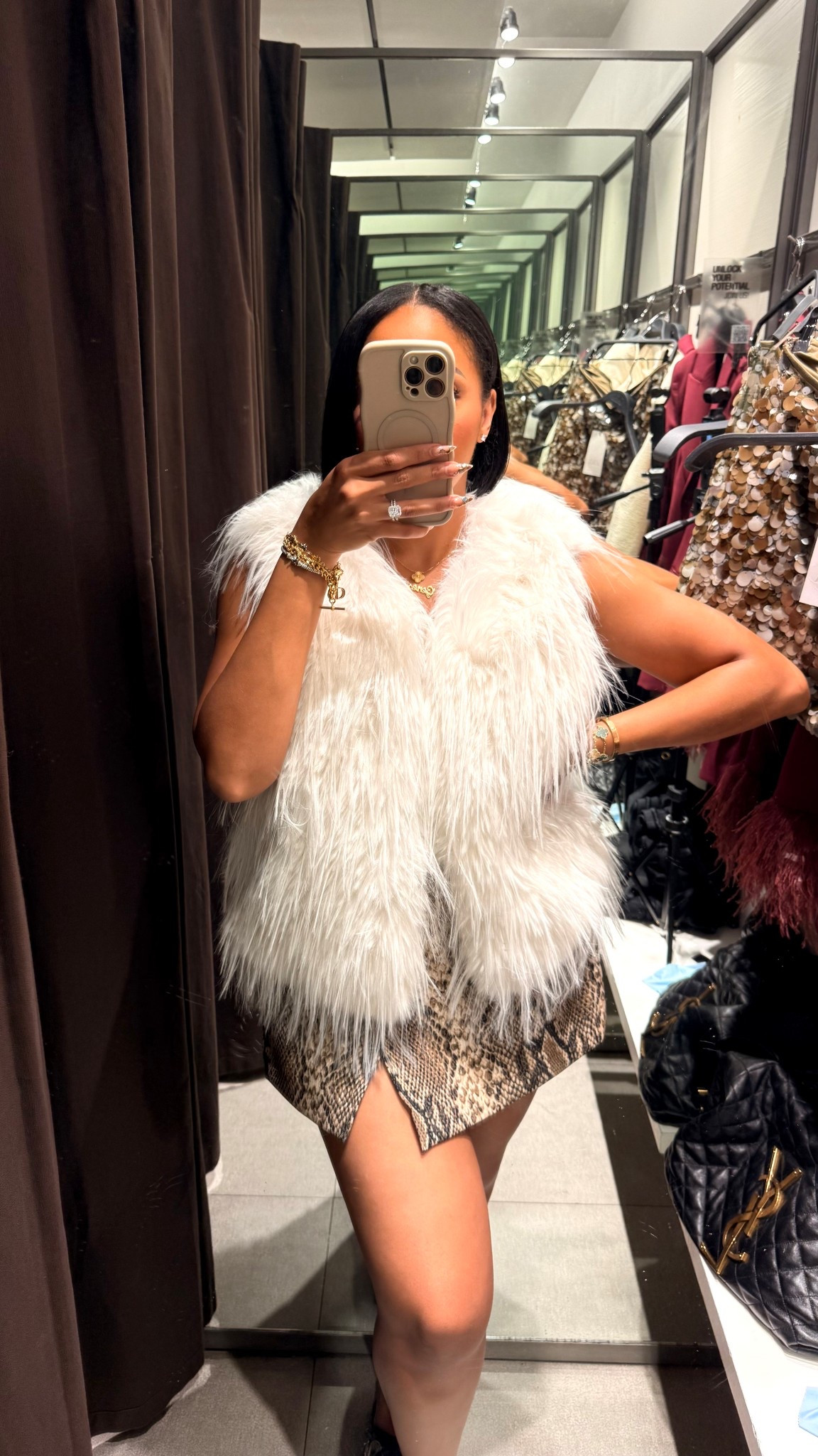 Soooo obsessed with this vest! Paired it with a snakeprint mini for a nice texture and color contrast.

#LTKStyleTip #LTKSeasonal #LTKFindsUnder100