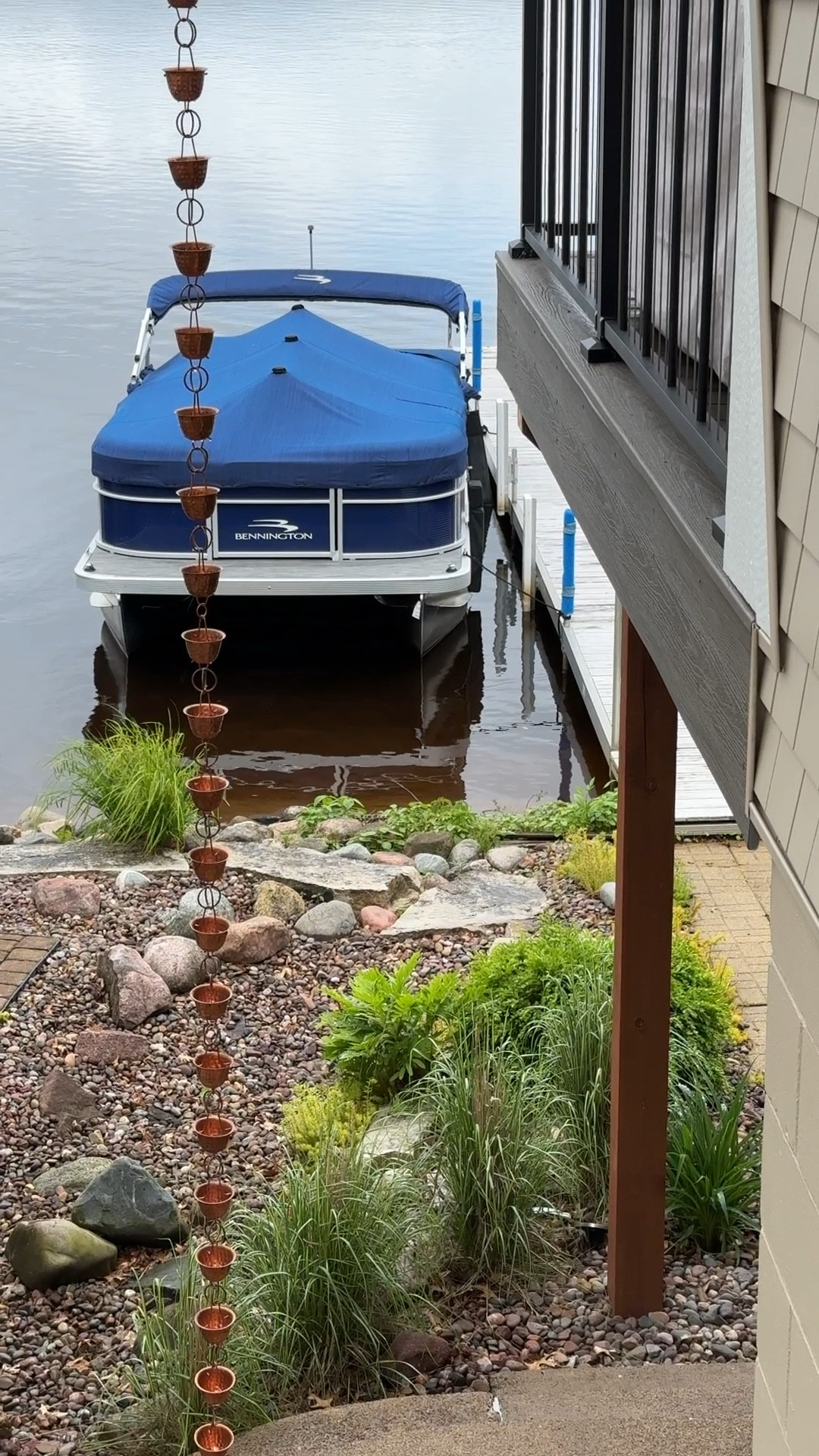 When you don’t want to see an ugly gutter downspout you use a copper rain chain. I chose a cup shaped design to handle heavier rains. This rain chain runs two levels so it’s two 8’ chains connected. A gutter adapter was used to connect it to the main gutter. 
kimbentley, outdoor decor, porch, landscape designn

#LTKHome #LTKSeasonal #LTKVideo