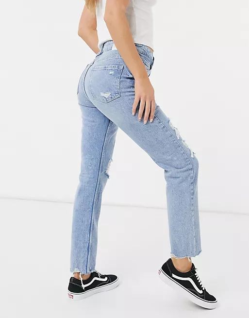 Bershka slim jeans with distressed hem in light blue | ASOS (Global)