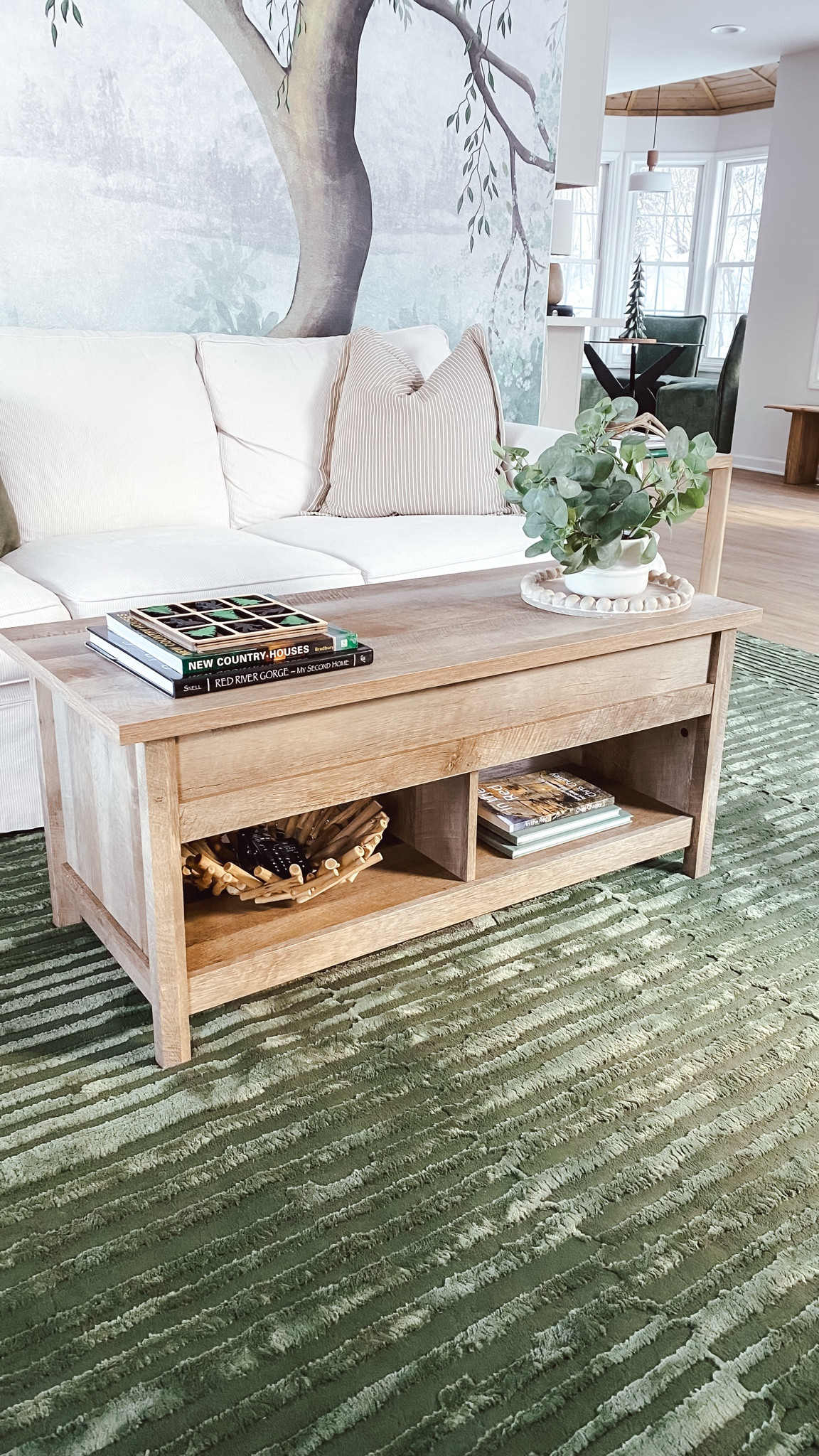 Another pottery barn lookalike piece for a lot less!  This coffee table has a lift top and extra storage space! So good!
Comes in four colors! Mine is color Lintel Oak.

#LTKHome